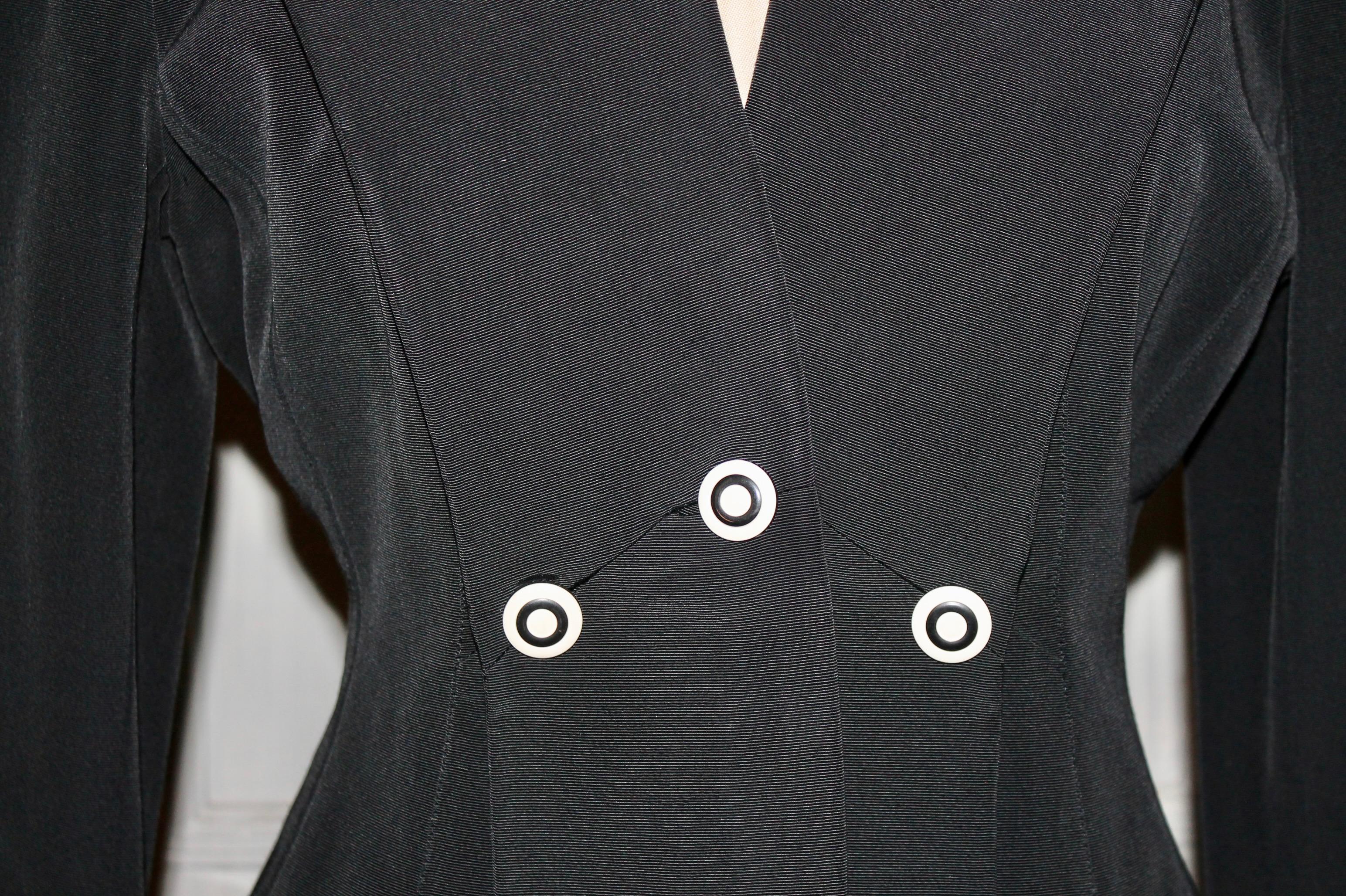 black jacket with white trim