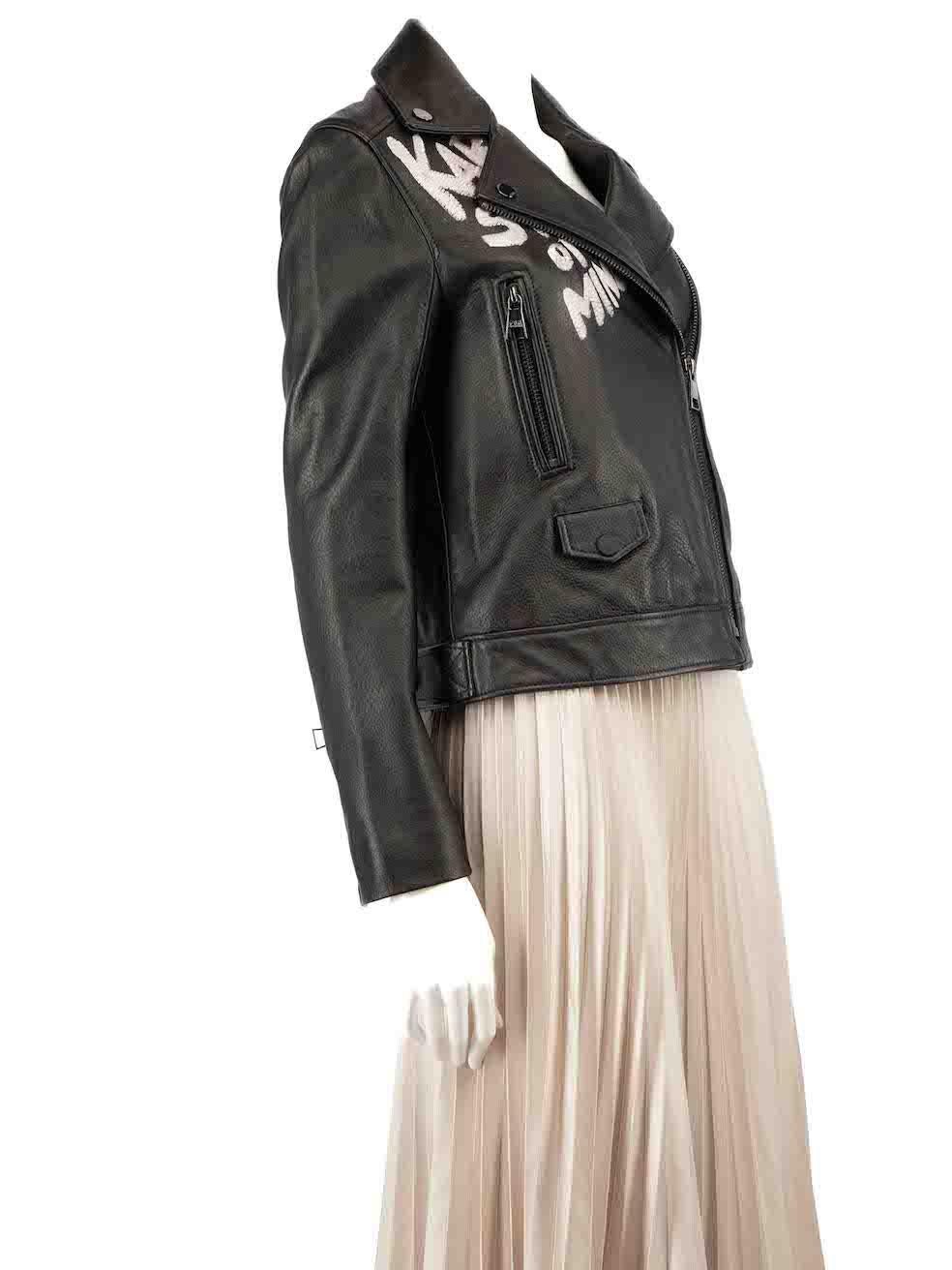 CONDITION is Very good. Hardly any visible wear to jacket is evident on this used Karl Lagerfeld designer resale item.
 
 Details
 Black
 Leather
 Biker jacket
 Painted white lettering
 Asymmetric zip fastening
 Zipped cuffs
 4x Front pockets
 
 
