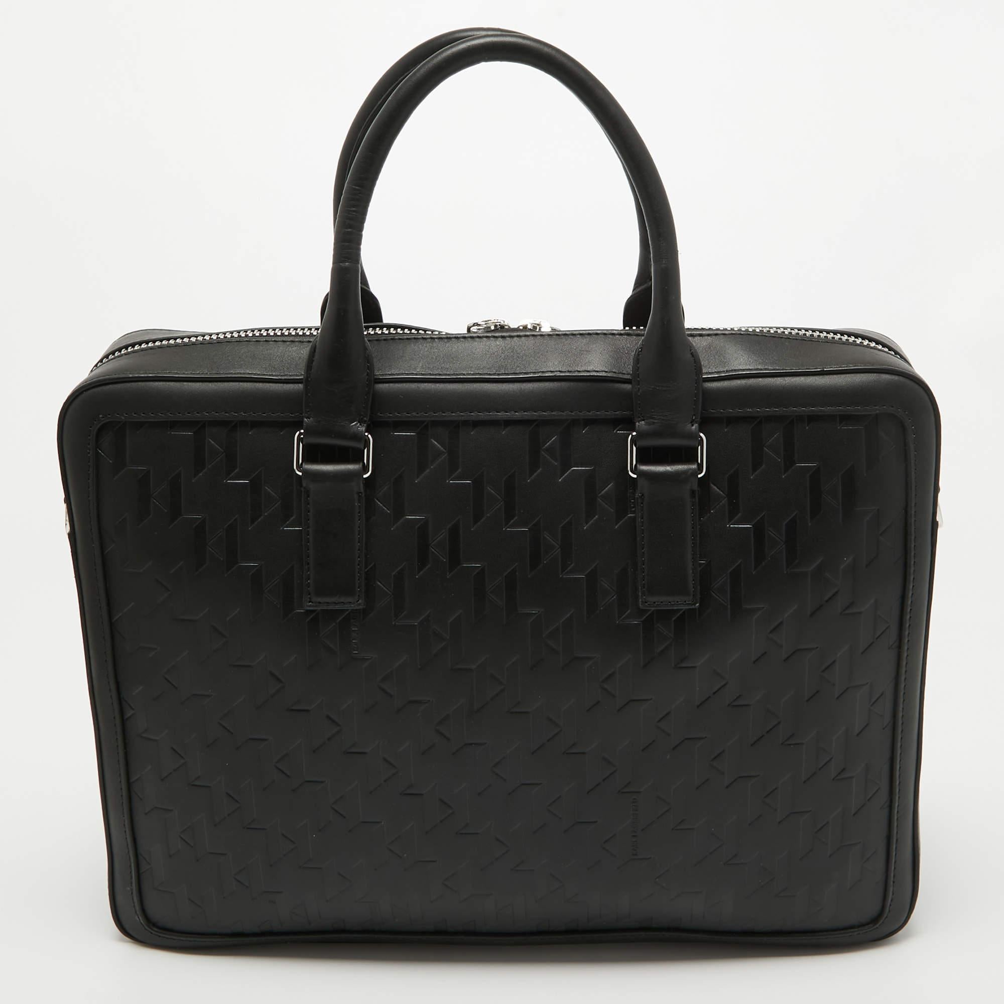 Perfect for housing your documents and other work essentials, this briefcase will make an elegant choice. Crafted with function in mind, this bag features a central capacious interior.

Includes: Original Dustbag, Detachable Strap, Info Card, Tag