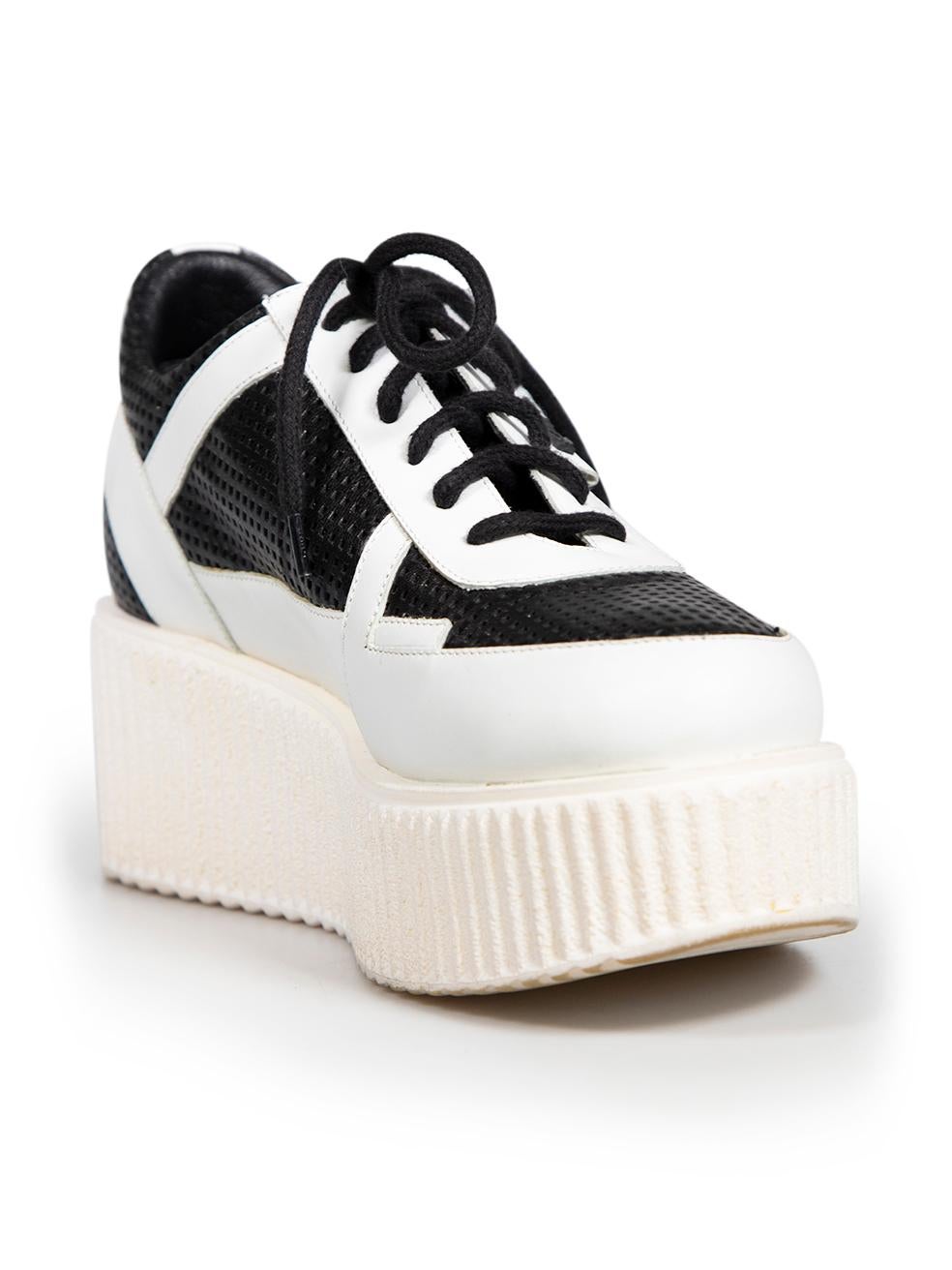 CONDITION is Very good. Minimal wear to trainers is evident. Minimal wear to soles and outsoles on this used Karl Lagerfeld designer resale item.
 
 
 
 Details
 
 
 Black
 
 Leather
 
 Trainers
 
 Low top
 
 White leather trim
 
 Chunky sole
 
