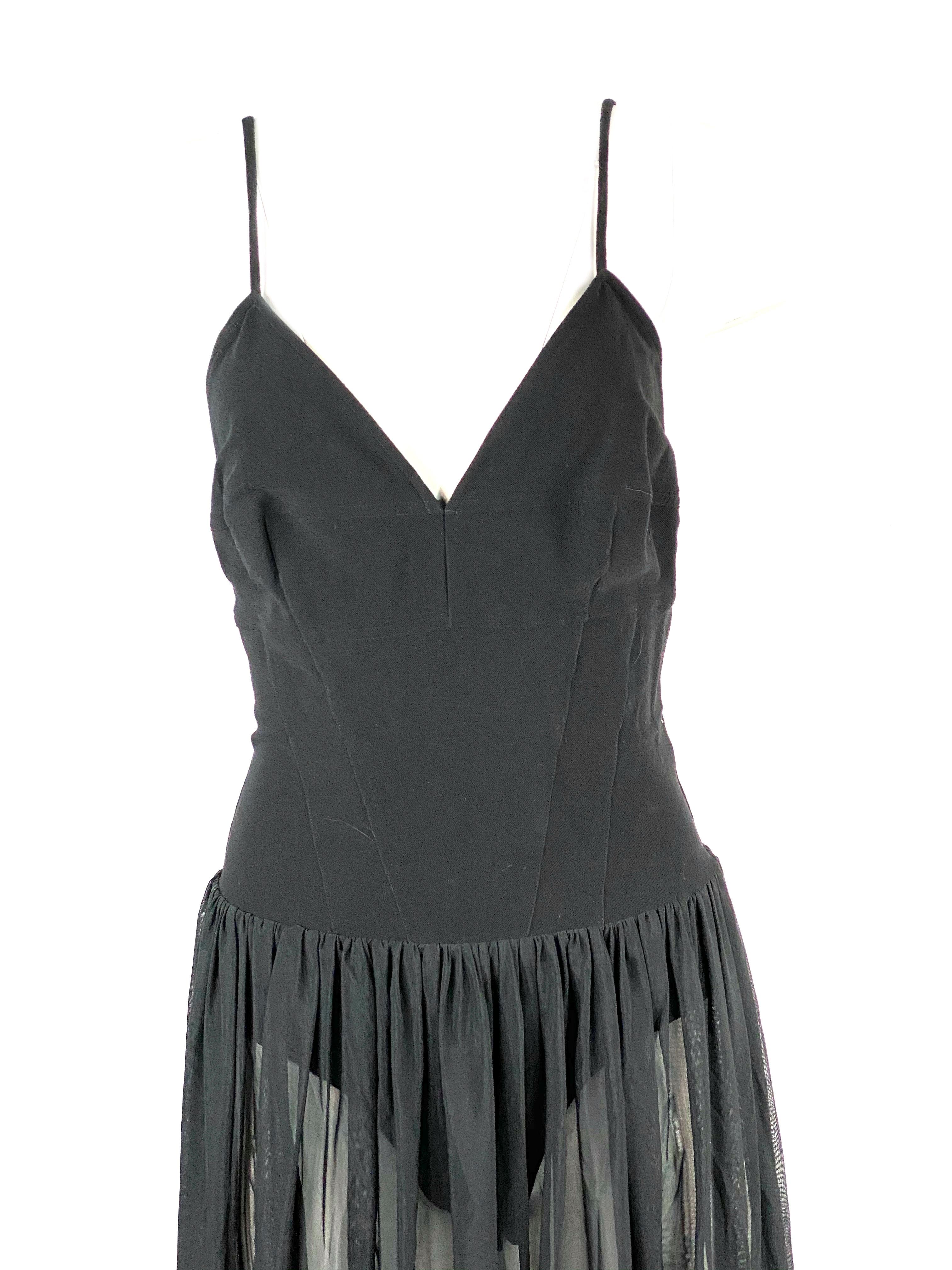 Karl Lagerfeld Black Spaghetti Strap Mini Dress Size 40

Product details:
Size 40
Featuring spaghetti strap, measure 7” on the front and 13” on the back
V neckline on the front
Open back 
See through skirt 
Rear zip and hook closure 
Made in France

