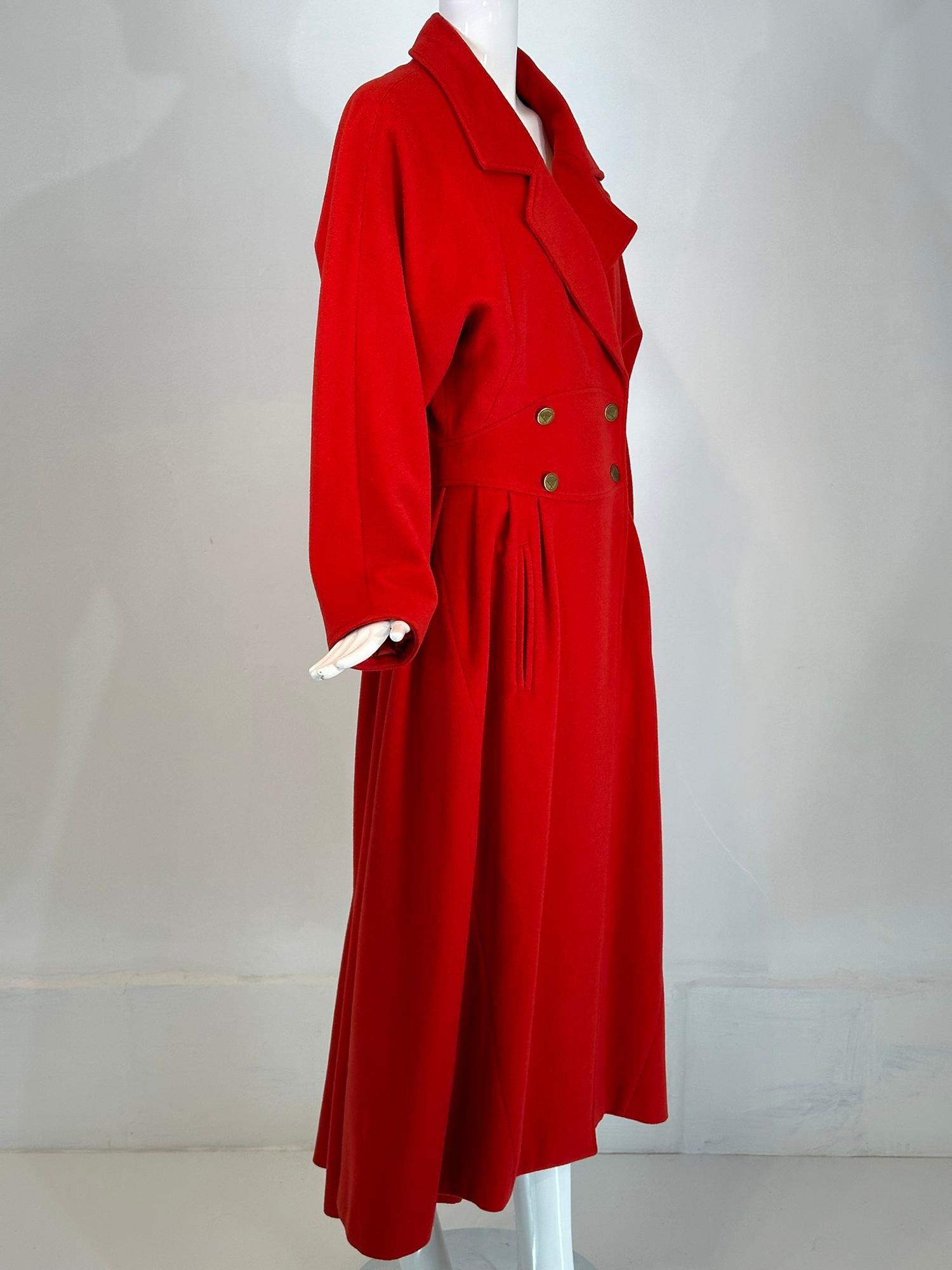 Karl Lagerfeld dramatic red wool dolman sleeve, yoke waist, full skirt maxi coat marked size 10 from the 1980s. Statement making, this coat has military flair. Double breasted with wide notched lapels, the waist is a wide yoke and fitted, the