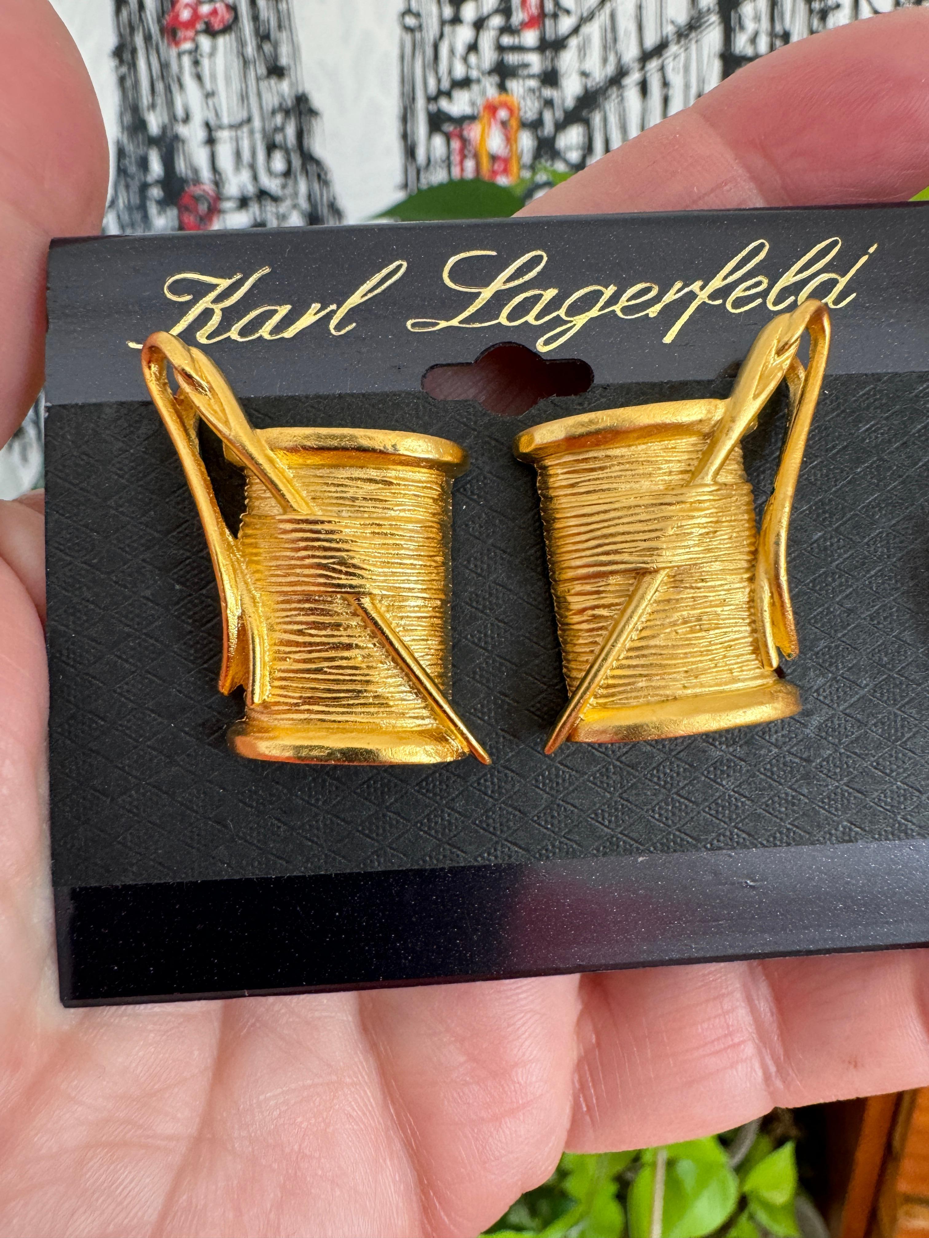 Pair of Lagerfeld Earrings, clips on's. Matching Brooch listed as well on our storefront. Earrings Measures 1.21 inch or 30.78mm top to bottom
.98 inches or  25.11mm at the widest. They are Still on the original earring card from Neiman Marcus. Tons