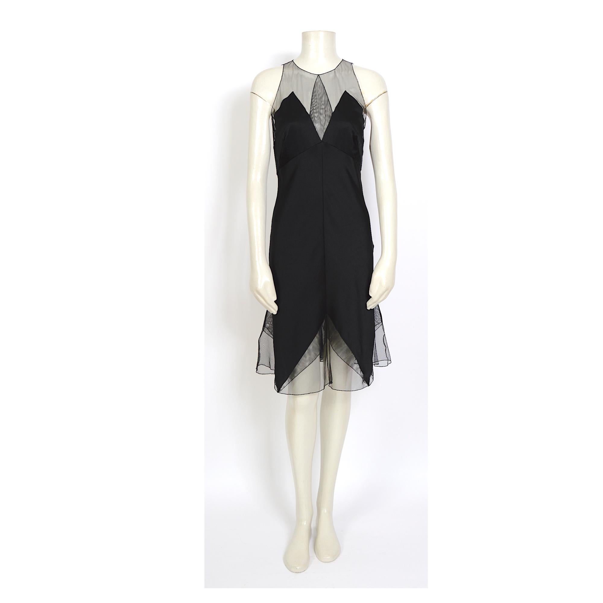 Absolutely stunning Karl Lagerfeld fall 1994 - 1995 vintage black silk dress and matching top
Made in light black silk and tulle material. The dress closes with covered fabric buttons at the back. Two buttons have been replaced.
Made in France -