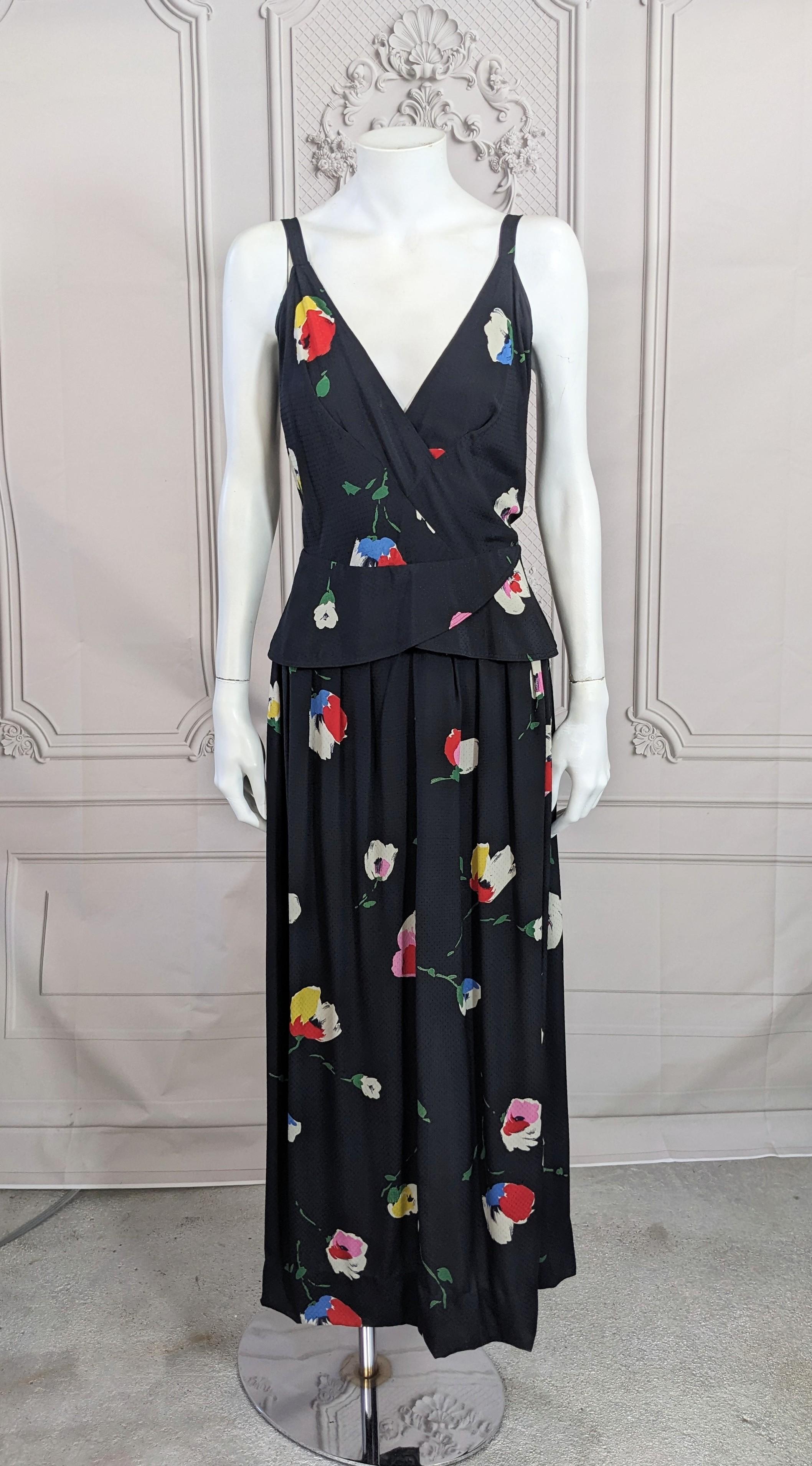 Karl Lagerfeld for Chloe Silk Crepe Print Gown from the 1970's. Charming faux wrap one piece design with attached peplum detail. Floral silk damask crepe print which closes with a series of hooks and zipper on back. From the period where Lagerfeld