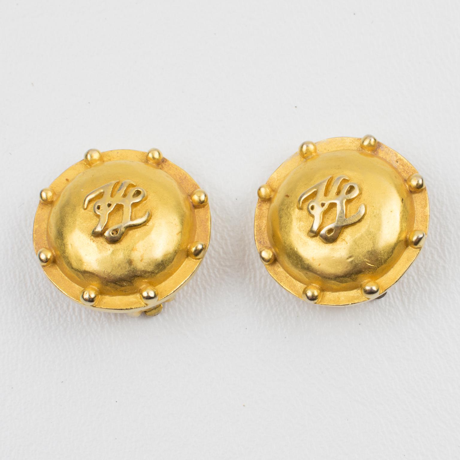 Karl Lagerfeld Gilt Metal Cabochon KL Clip Earrings In Excellent Condition In Atlanta, GA