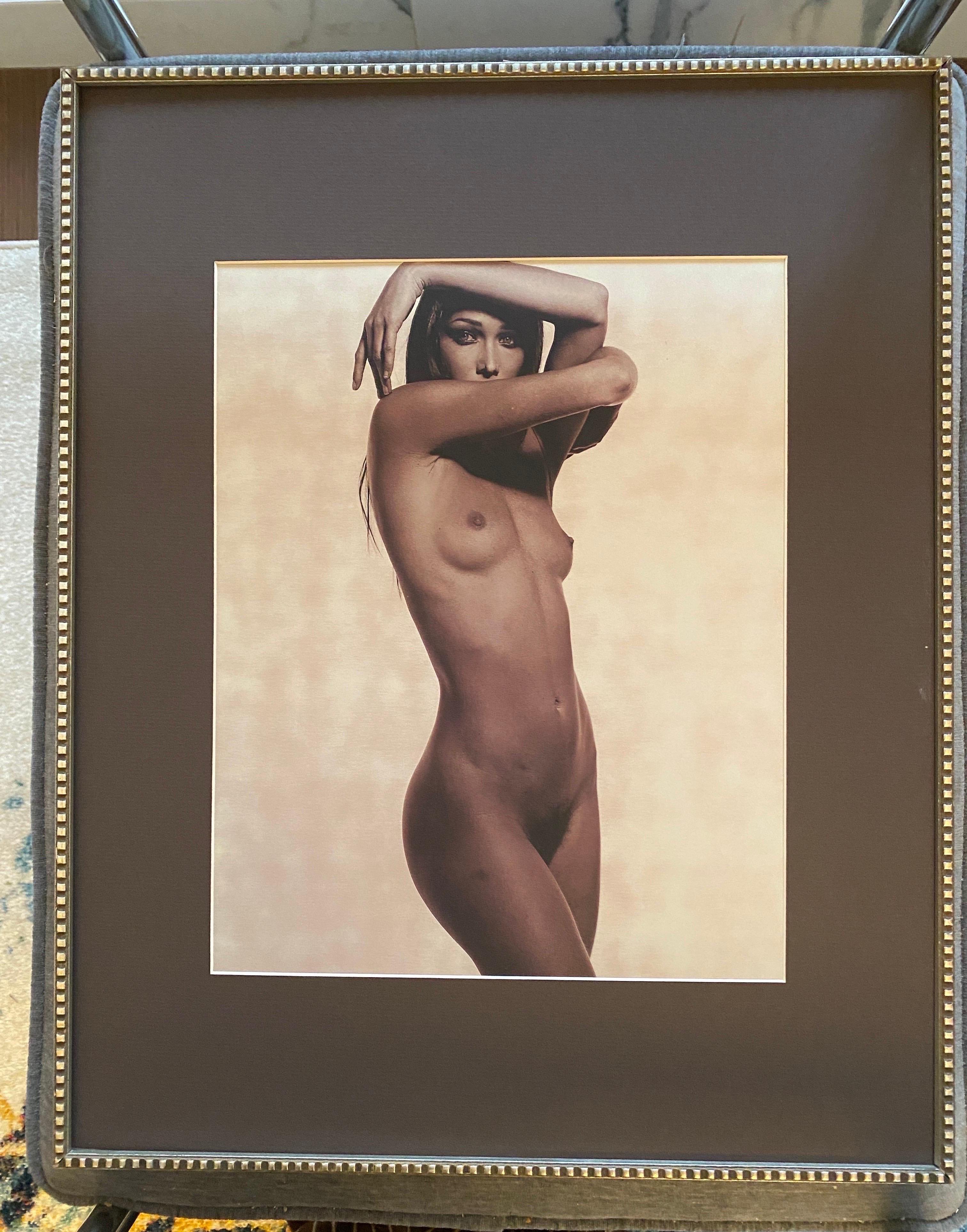 Karl Lagerfeld photograph of Karla Bruni, 1997. Ms. Bruni was a French supermodel, successful recoding artist and also became the First Lady of France. 

This beautiful female nude of Ms. Bruni was included in a boxed series of photograph