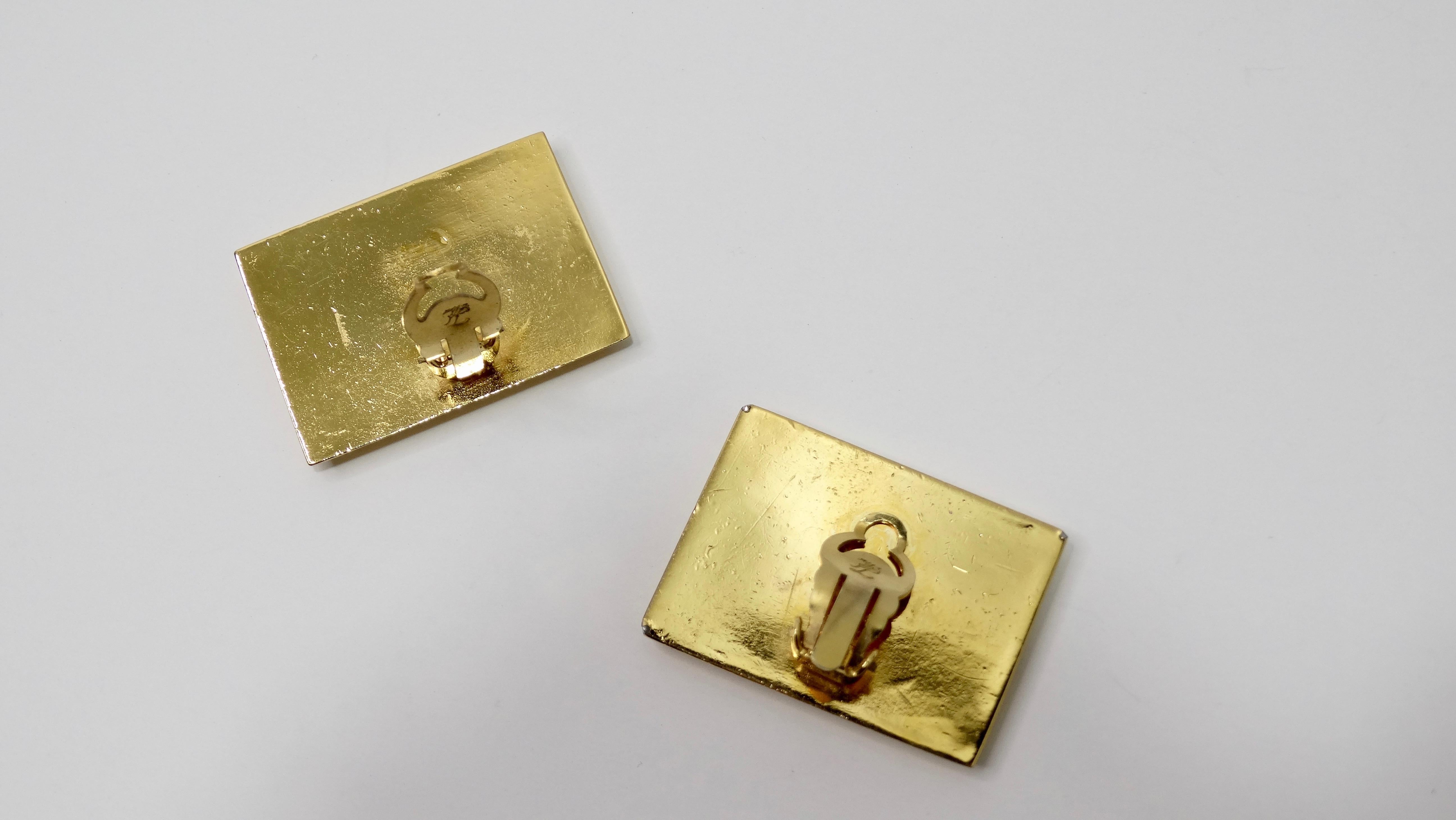 Get your hands on some rare vintage Lagerfeld with these adorable earrings! Circa 1980s, these letter/postcard earrings are gold plated and are embossed with Karl Lagerfeld Paris. Clip on closures that are stamped in Lagerfeld's signature cursive