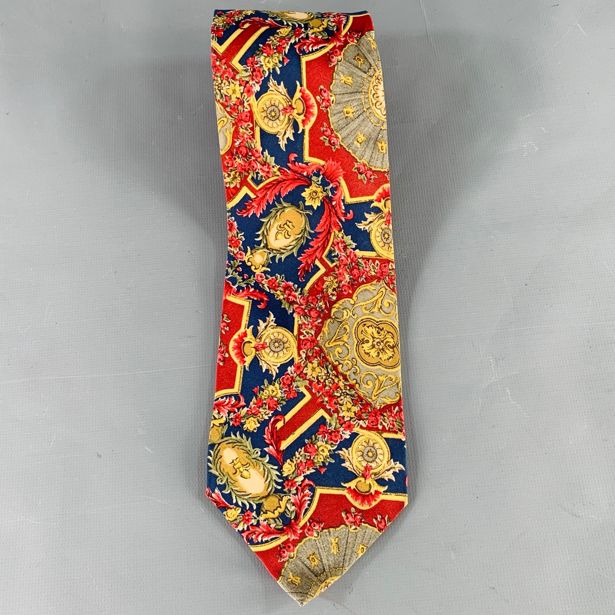 KARL LAGERFELD necktie
in a red, blue, and gold silk featuring a baroque pattern with florals. Handmade in Italy.Very Good Pre-Owned Condition.Width: 3.5 inches Length: 59 inches 
  
  
 
Sui Generis Reference: 136927
Category: Tie
More Details
   
