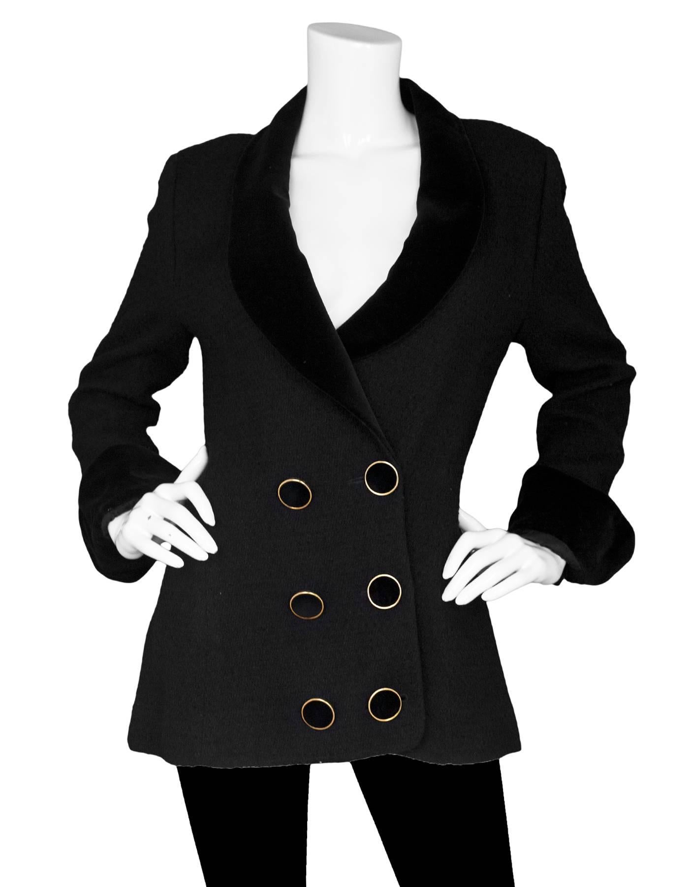 Karl Lagerfeld Vintage Black Boucle & Velvet Jacket

Made In: France
Color: Black
Composition: Not listed, feels like wool blend
Lining: Black textile
Closure/Opening: Front button closure
Exterior Pockets: None
Interior Pockets: None
Overall