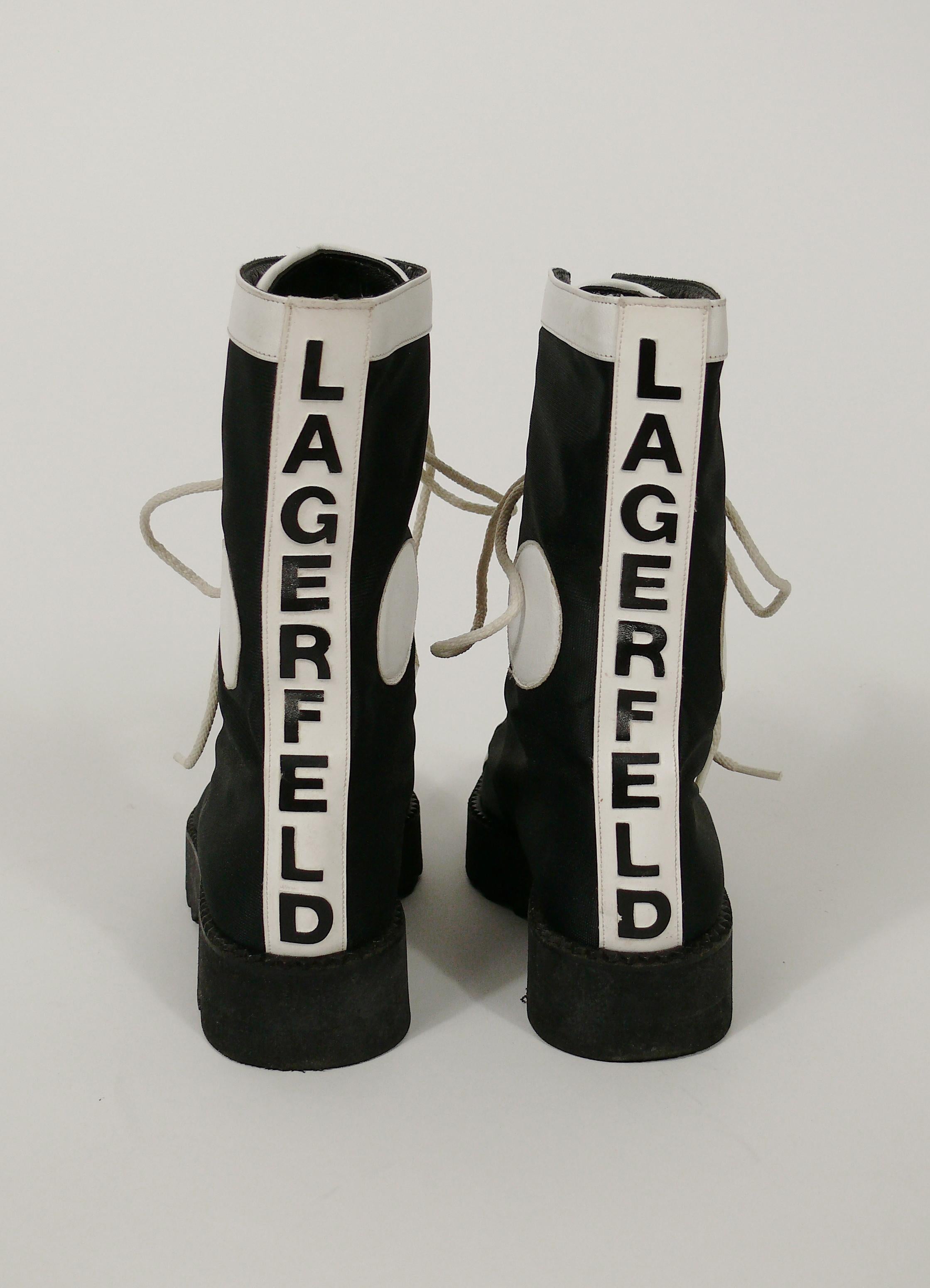 KARL LAGERFELD vintage rare 1990s black and white lace up combat boots.

These boots feature :
- Lightweight black synthetic material body with white leather details.
- Lace up front.
- Platform soles.
- Black LAGERFELD lettering signature.
- Black
