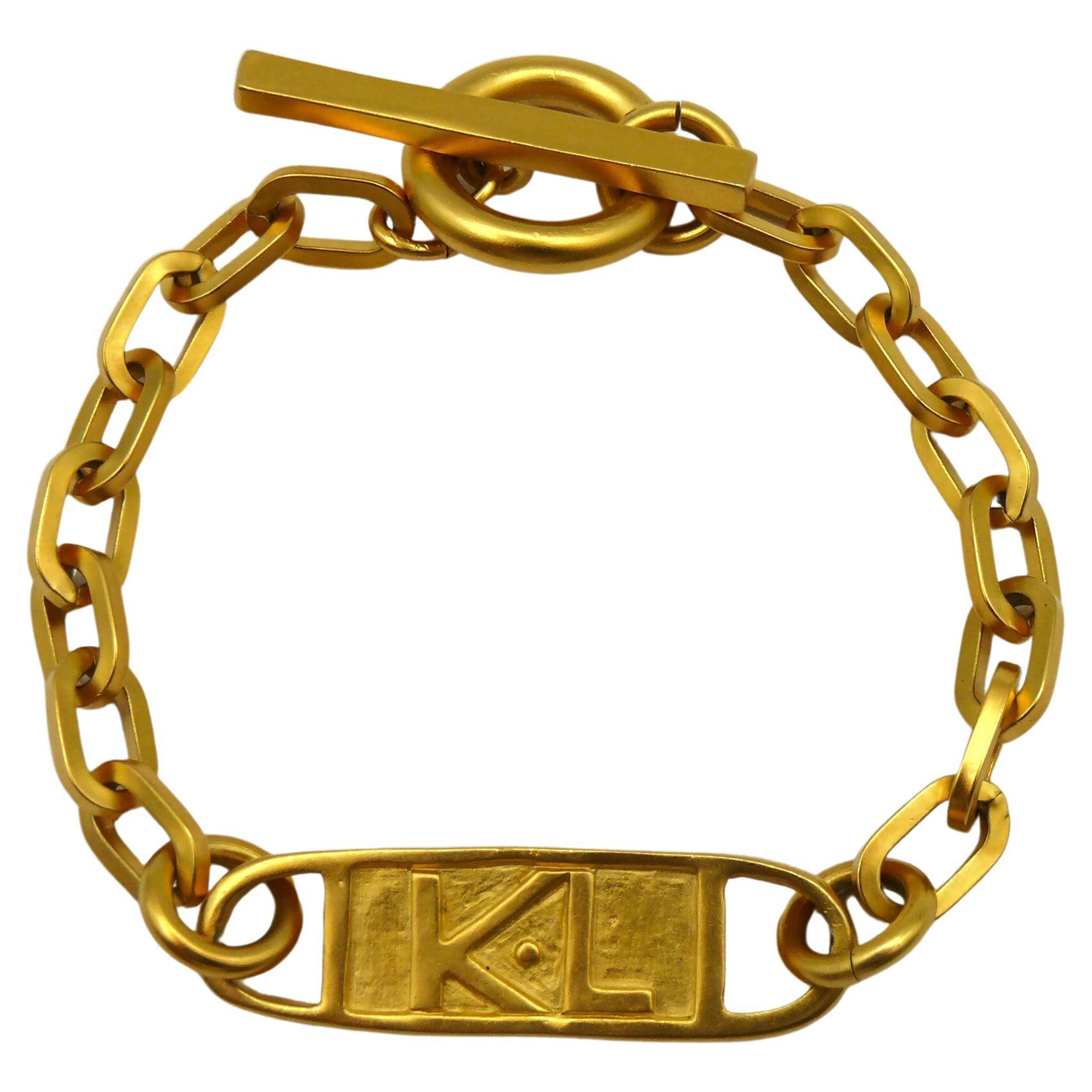 KARL LAGERFELD Vintage Gold Tone Logo ID Plate Chain Bracelet For Sale