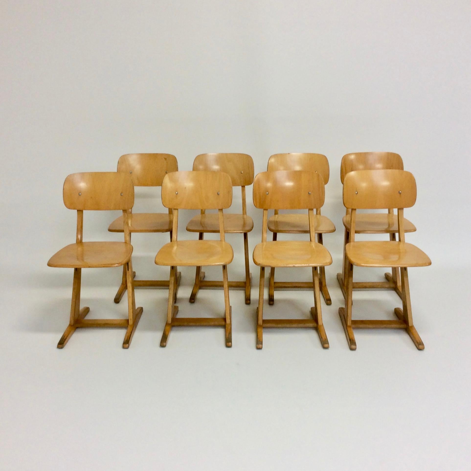 Set of 8 chairs by Karl Nothhelfer for Casala, circa 1960, Germany.
Solid and comfortable chairs.
Varnished light wood and plywood.
Dimensions: 80 cm H, 38 cm W, 45 cm D, seat height: 46 cm.
Good vintage condition.
  