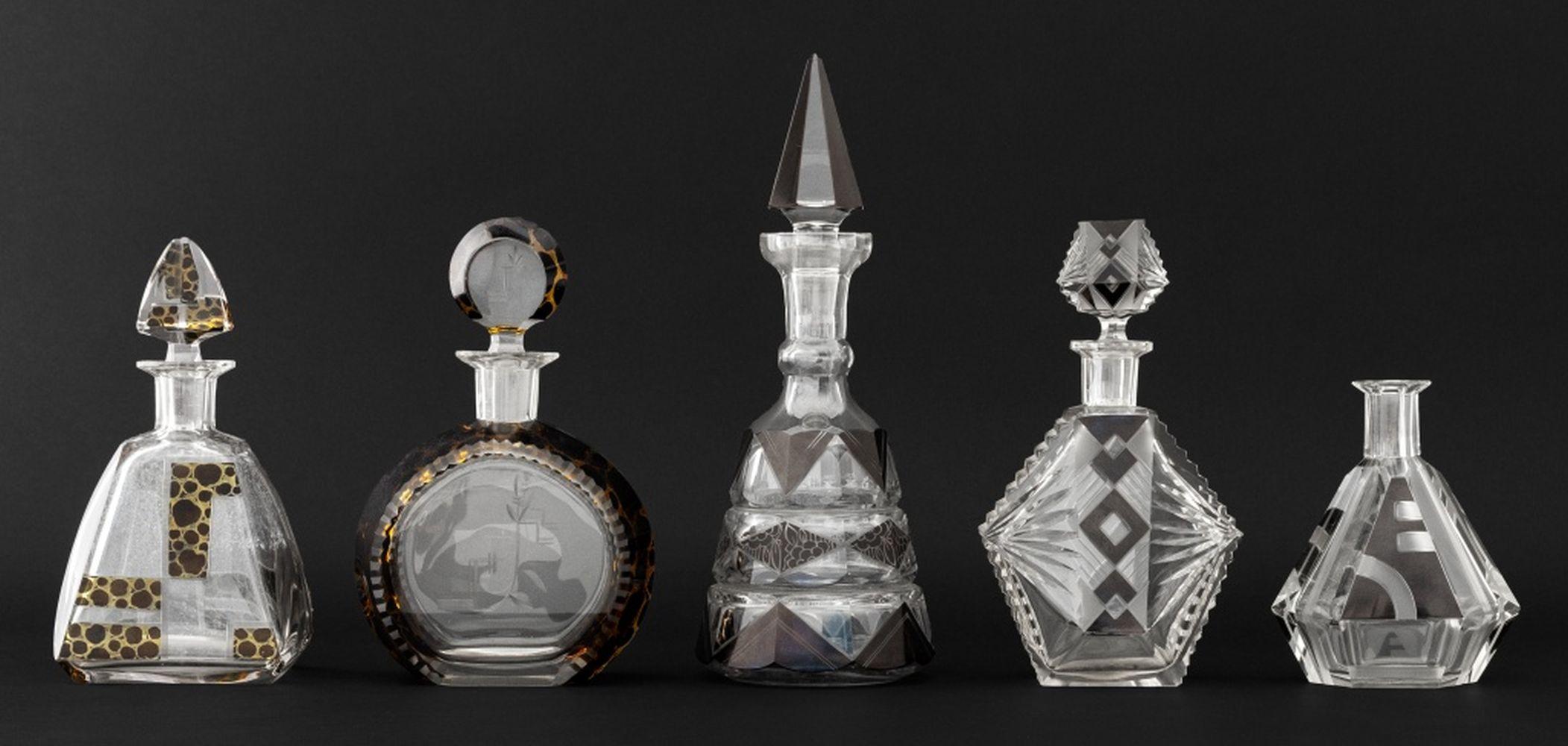 Collection of Nine Karl Palda Attributed Bohemian Glass Barware, comprising: (2) two with leopard print design and (3) three with geometric black and clear glass, (2) black enamel decanter and matching shot glass, one (1) black enamel decanter with