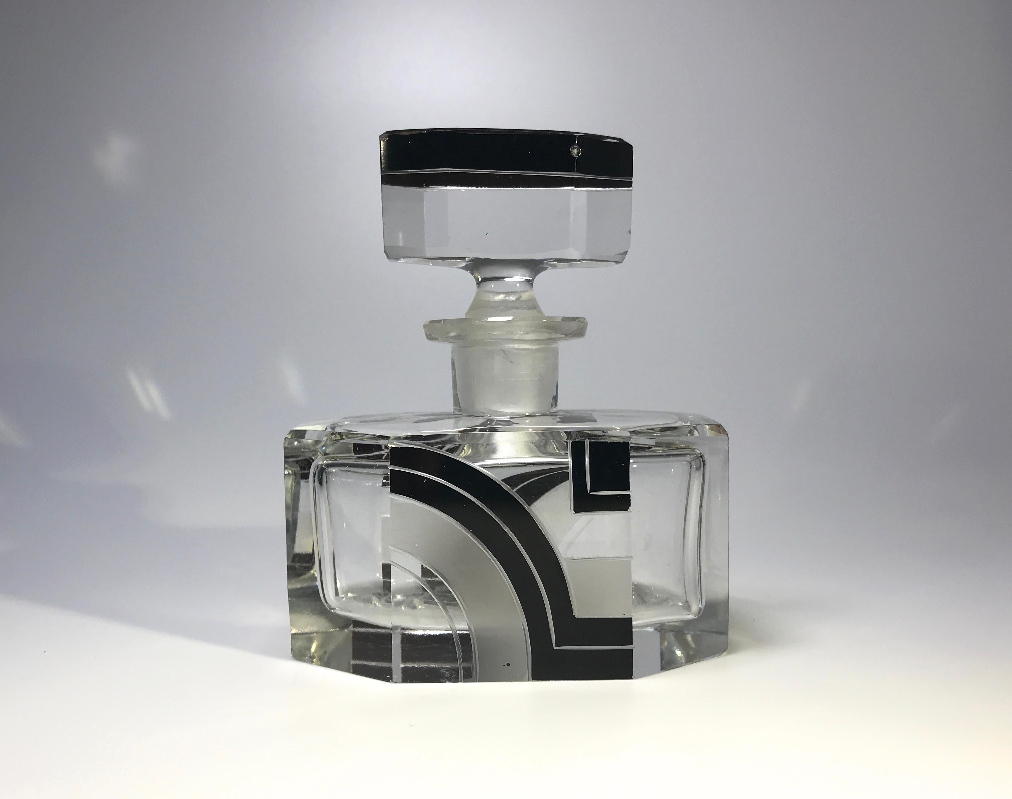 Fabulous Karl Palda Art Deco large crystal four piece vanity set from the 1930s
Consists of an impressive perfume bottle with stopper, atomiser, a large covered trinket box and a vanity tray
Superbly Classic, bold black enamel geometric