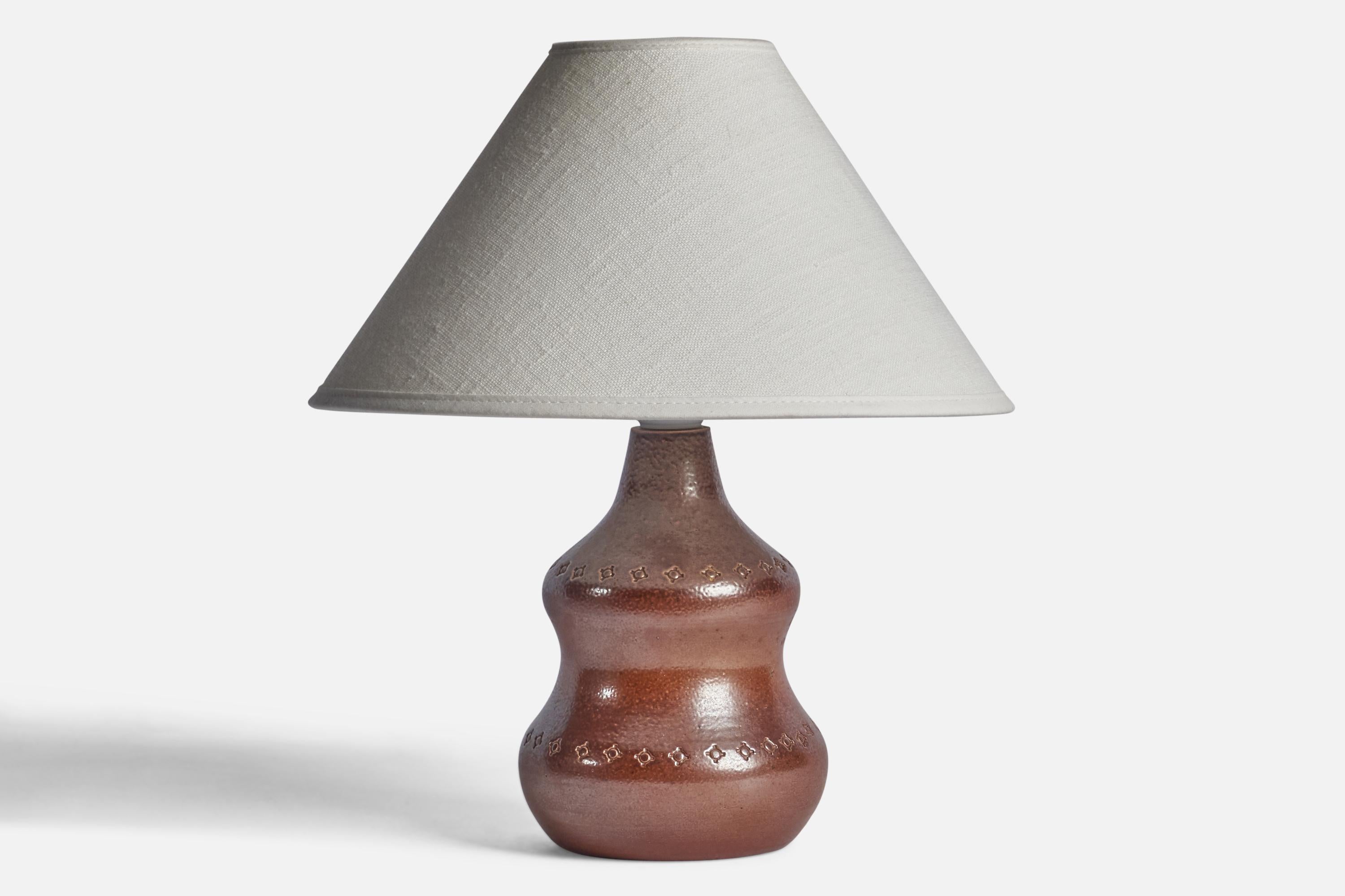 A brown-glazed table lamp designed and produced by Karl Persson, Sweden, 1940s.

Dimensions of Lamp (inches): 8.15” H x 4.5” Diameter
Dimensions of Shade (inches): 2.5” Top Diameter x 10” Bottom Diameter x 5.5