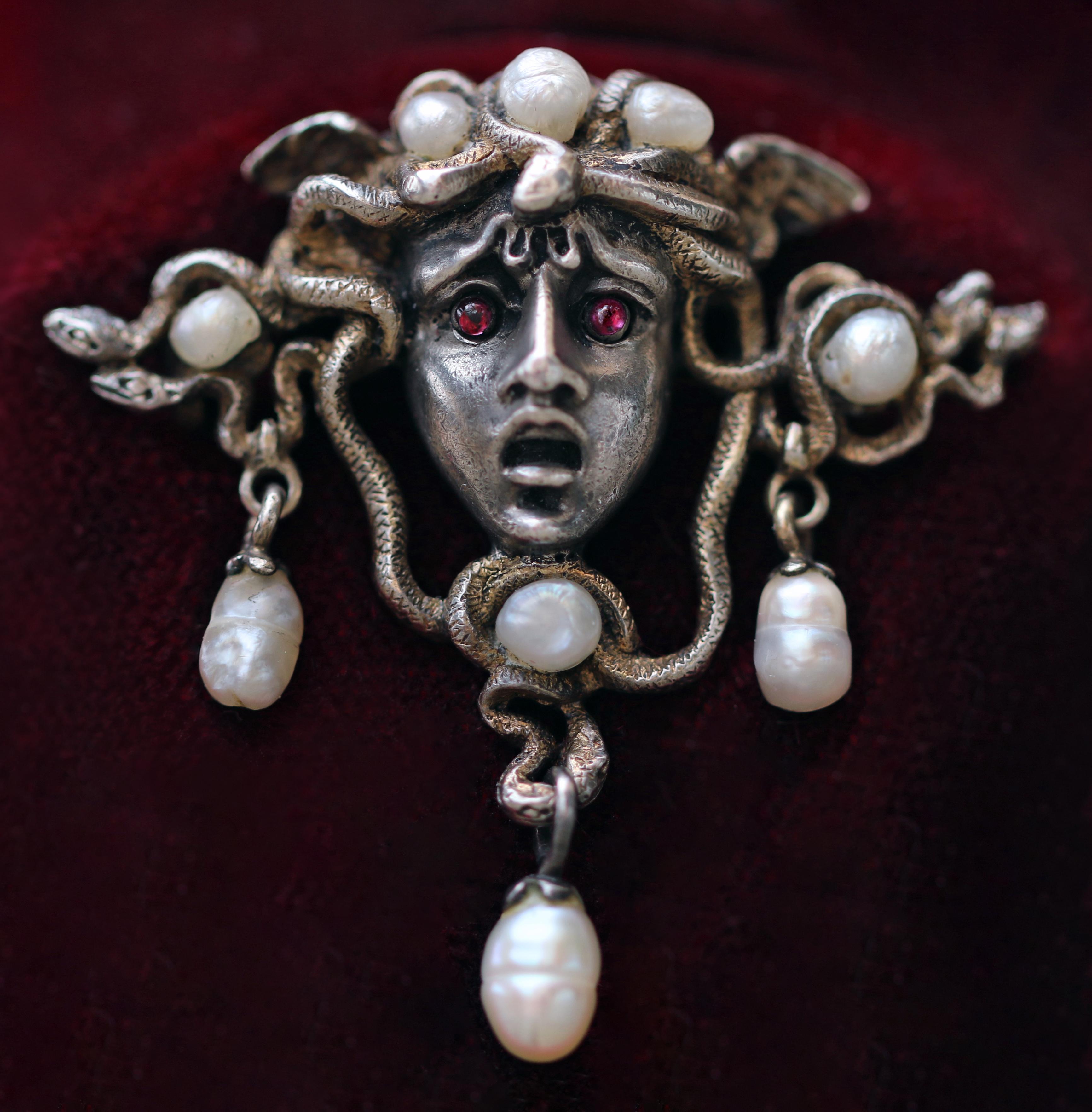 A fabulous example of a 'fin de siècle' symbolist jewel. 
Medusa the original 'Femme Fatale’ is beautifully portrayed in this exquisite brooch. 
The powerful protective significance of the Greek Myth has fascinated artists for millennia. There are