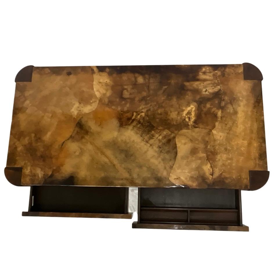 Karl Springer - Authenticated

11/06/1976

Extremely Rare Lacquered Goatskin Desk

Features Angular Legs

2 Drawers (one with Pencil Rail)

All Original Condition

Beautiful Brown & Tan Tones Throughout

This Desk is Dated on the Underside as shown
