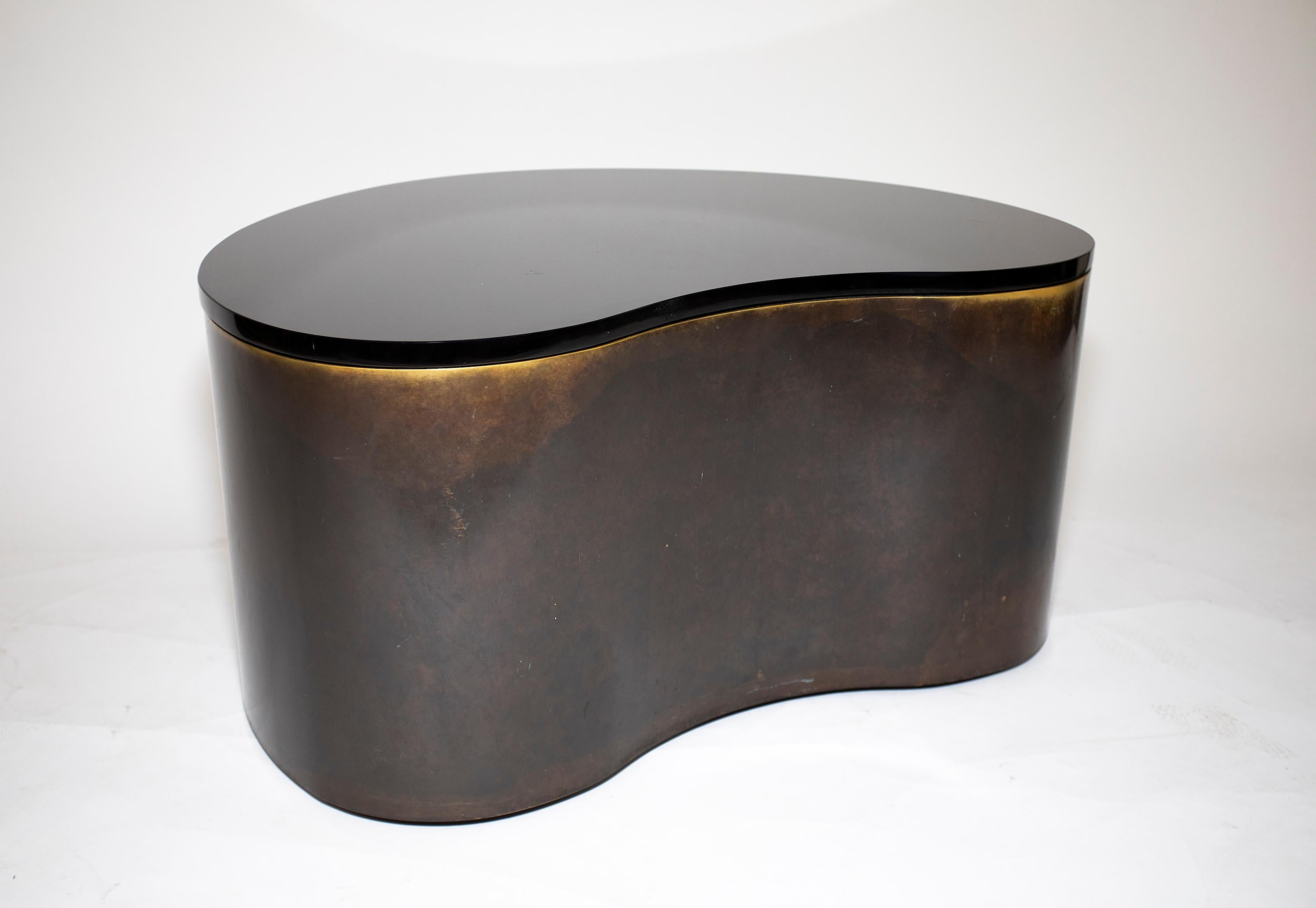 Karl Springer Amoeba table.
Bronze patinated brass and black glass top.