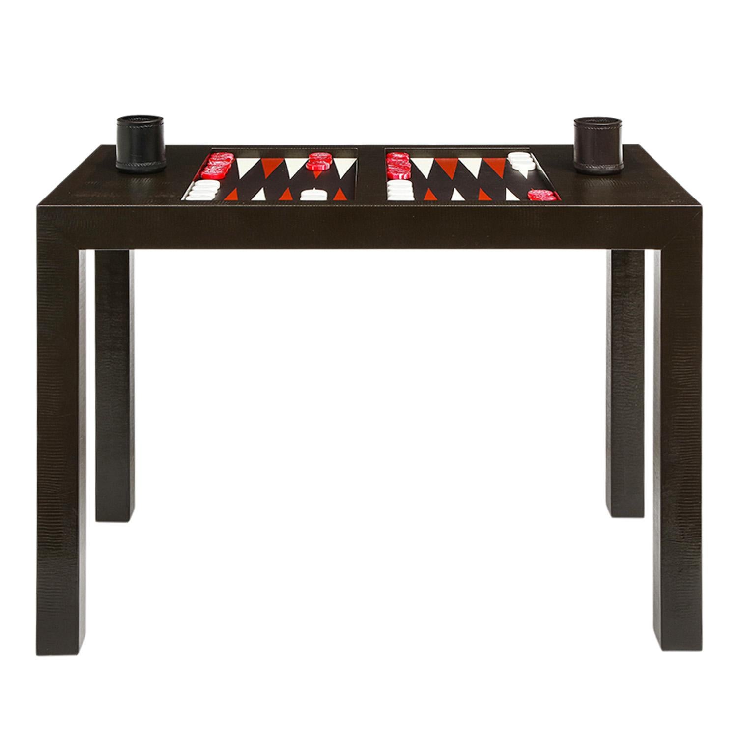 Early and rare game table with backgammon board in embossed lizard leather by Karl Springer, American 1970's (remnants of old Karl Springer leather label on bottom).

Reference:
Karl Springer LTD Brown Paper Catalog published in the 1970’s, page