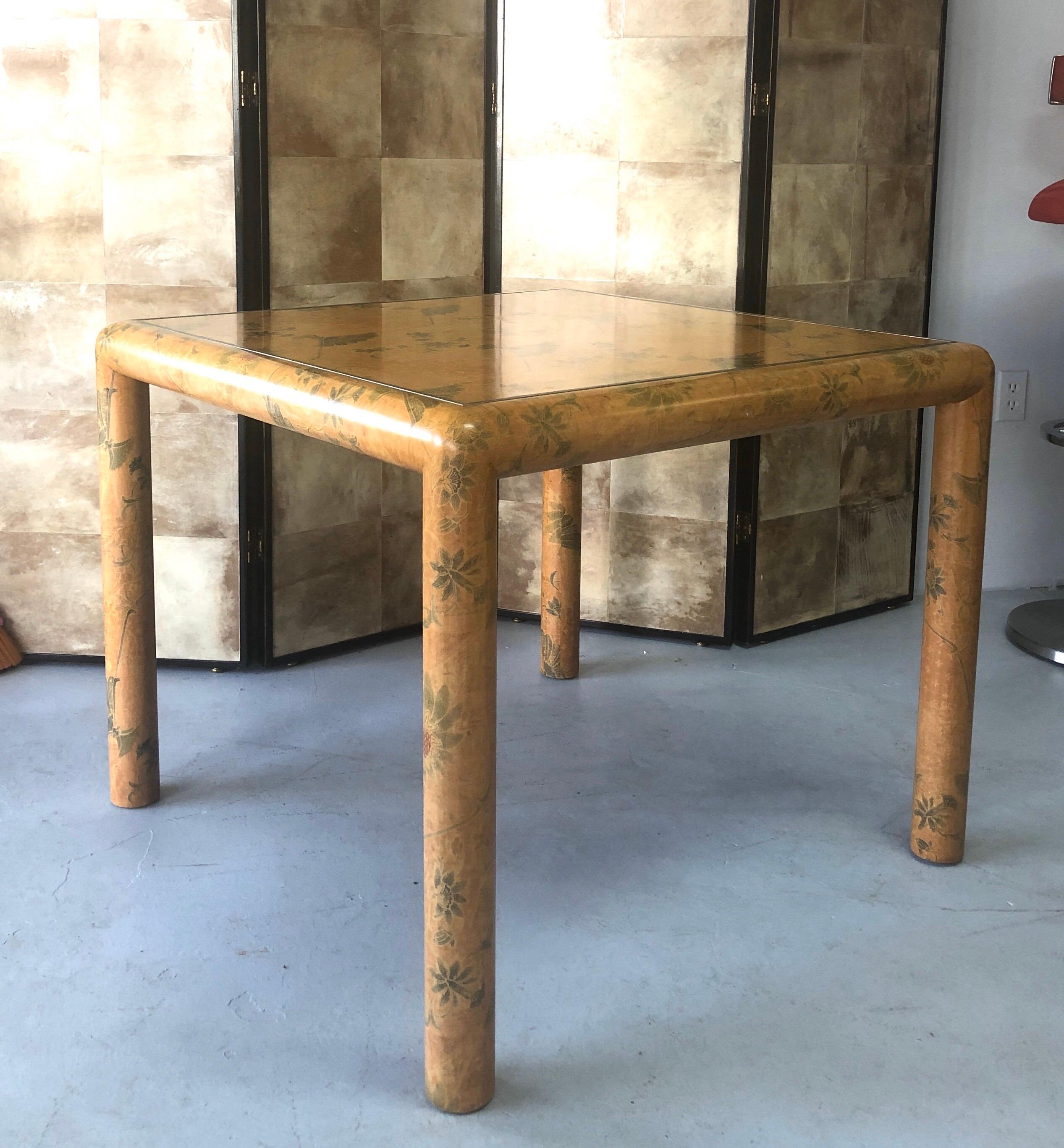 A rare table by Karl Springer. Beautifully covered in batik with a subtle elegant design.