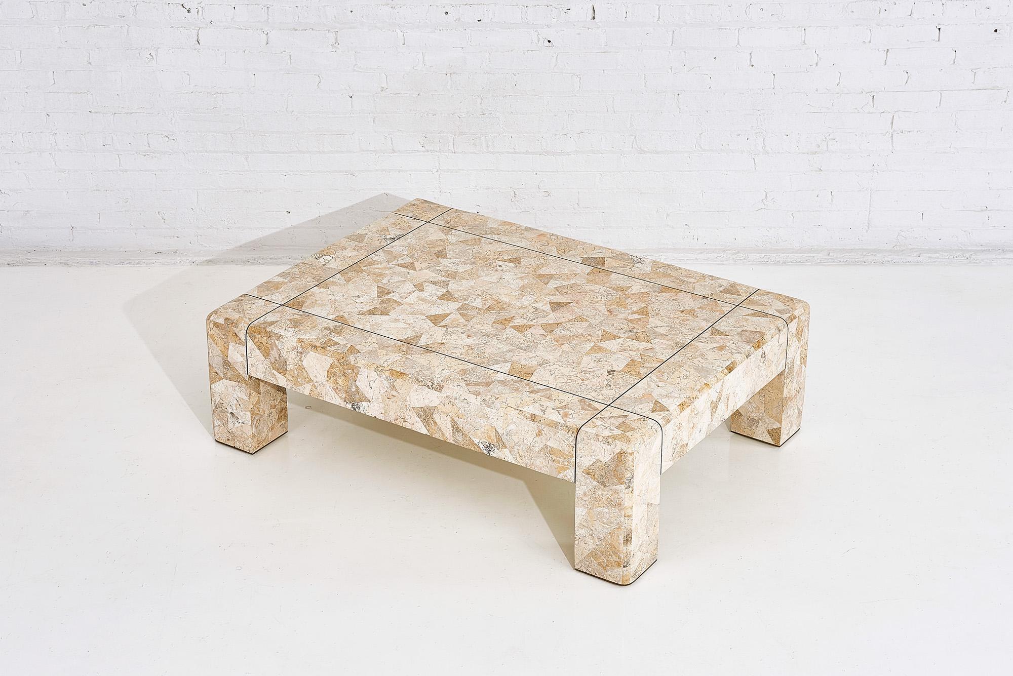 Karl Springer brass and tessellated travertine coffee table, circa 1970s.