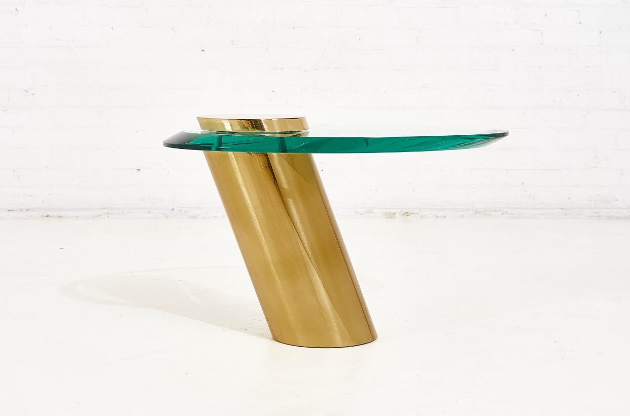 Karl Springer brass with cantilevered glass side table, 1980.