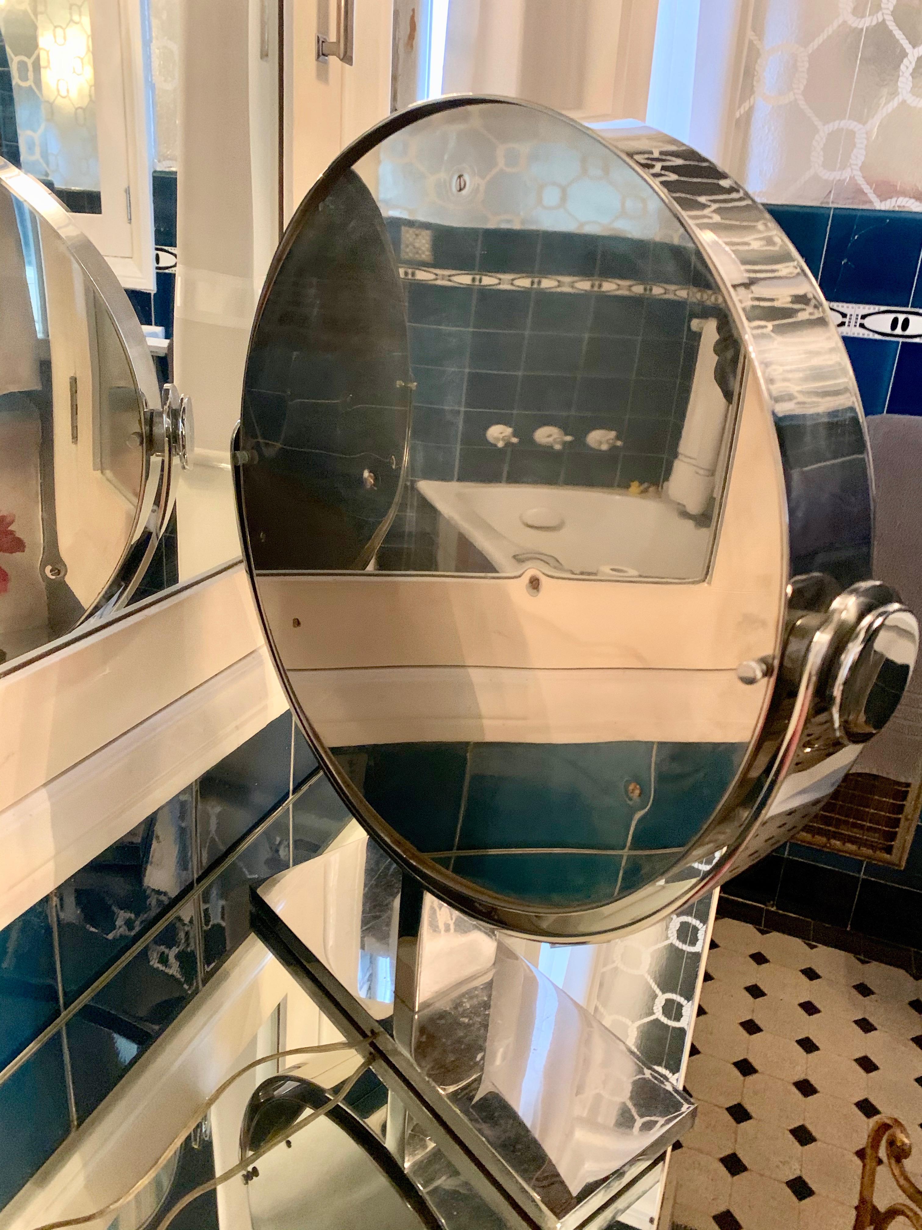 Hello gorgeous! If you are a celebrity, rock star, or just think you are... this is the mirror for you! Your face will thank you!

A rare Springer polished chrome table or vanity mirror with magnification. The perimeter of the piece is lit and the