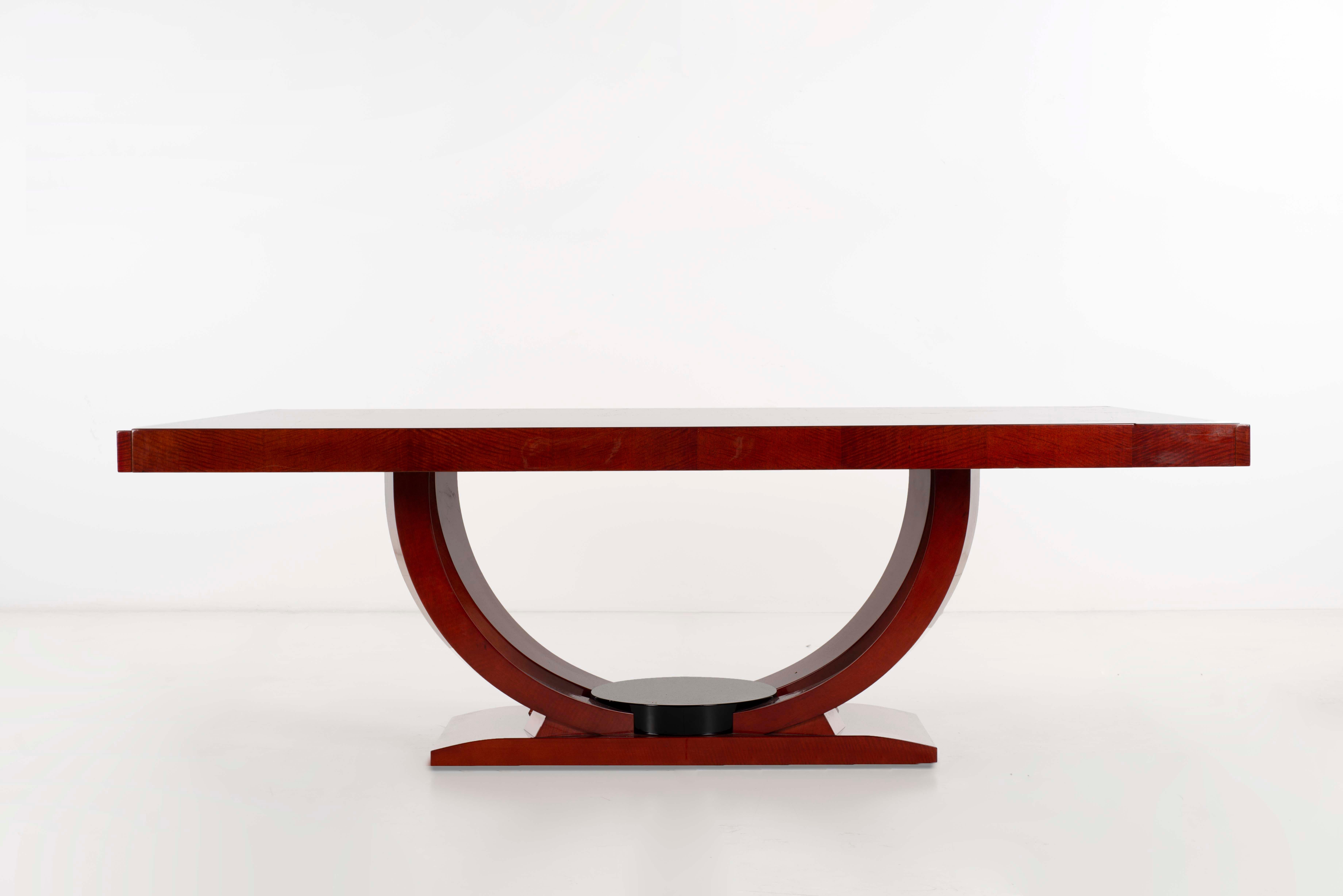 Karl Springer Dining Table for 10  
Eighty four inch long (one piece) in Rare Bubinga (African mahogany) with ebonized accent on base. Seats 10 comfortably.
   