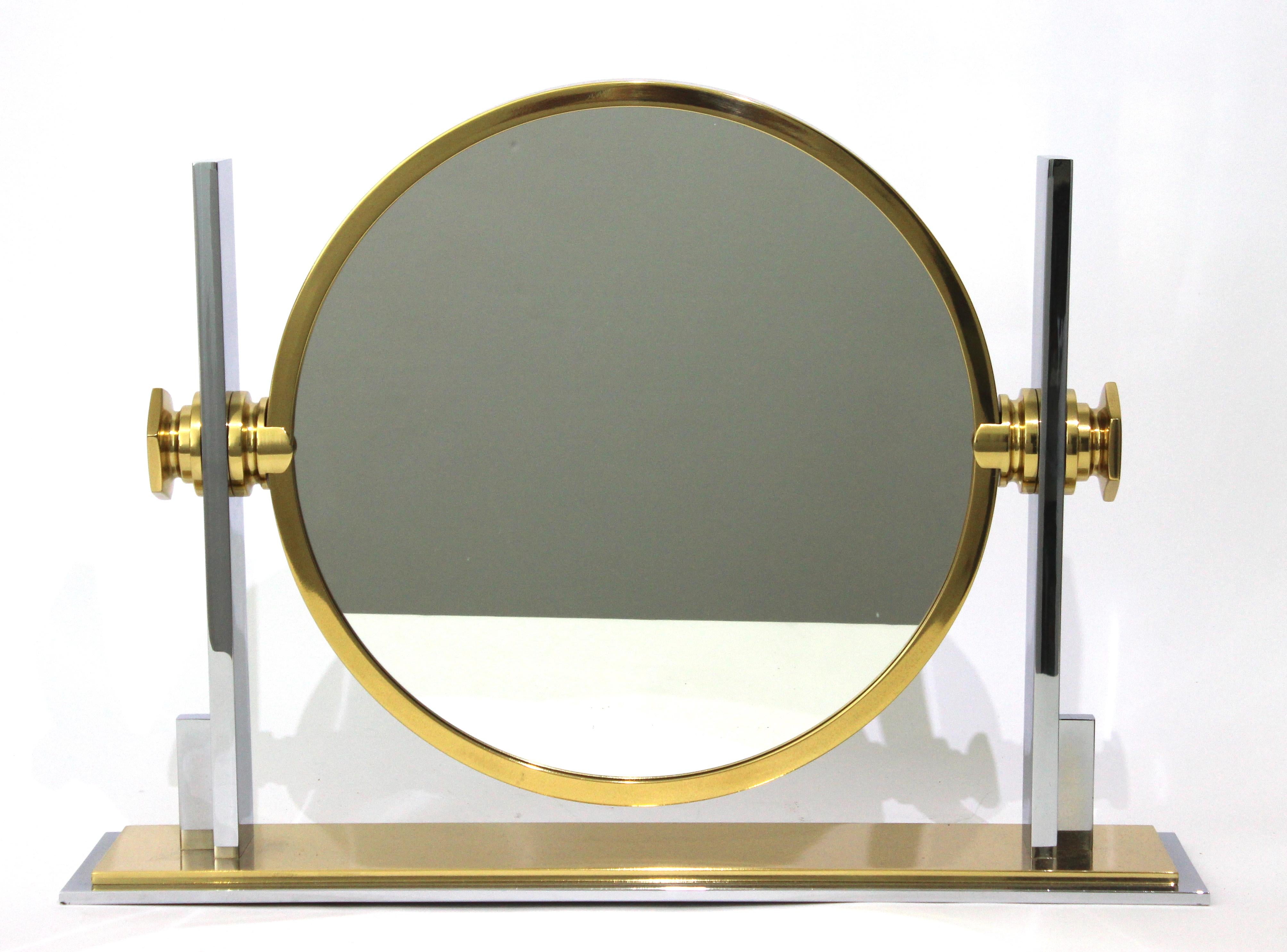 This iconic Karl Springer Art Deco inspired vanity make-up mirror dates to the 1970s-1980s and will make a definite statement with its form and use of materials.

Note: One mirror has normal magnification and the other side is concave and