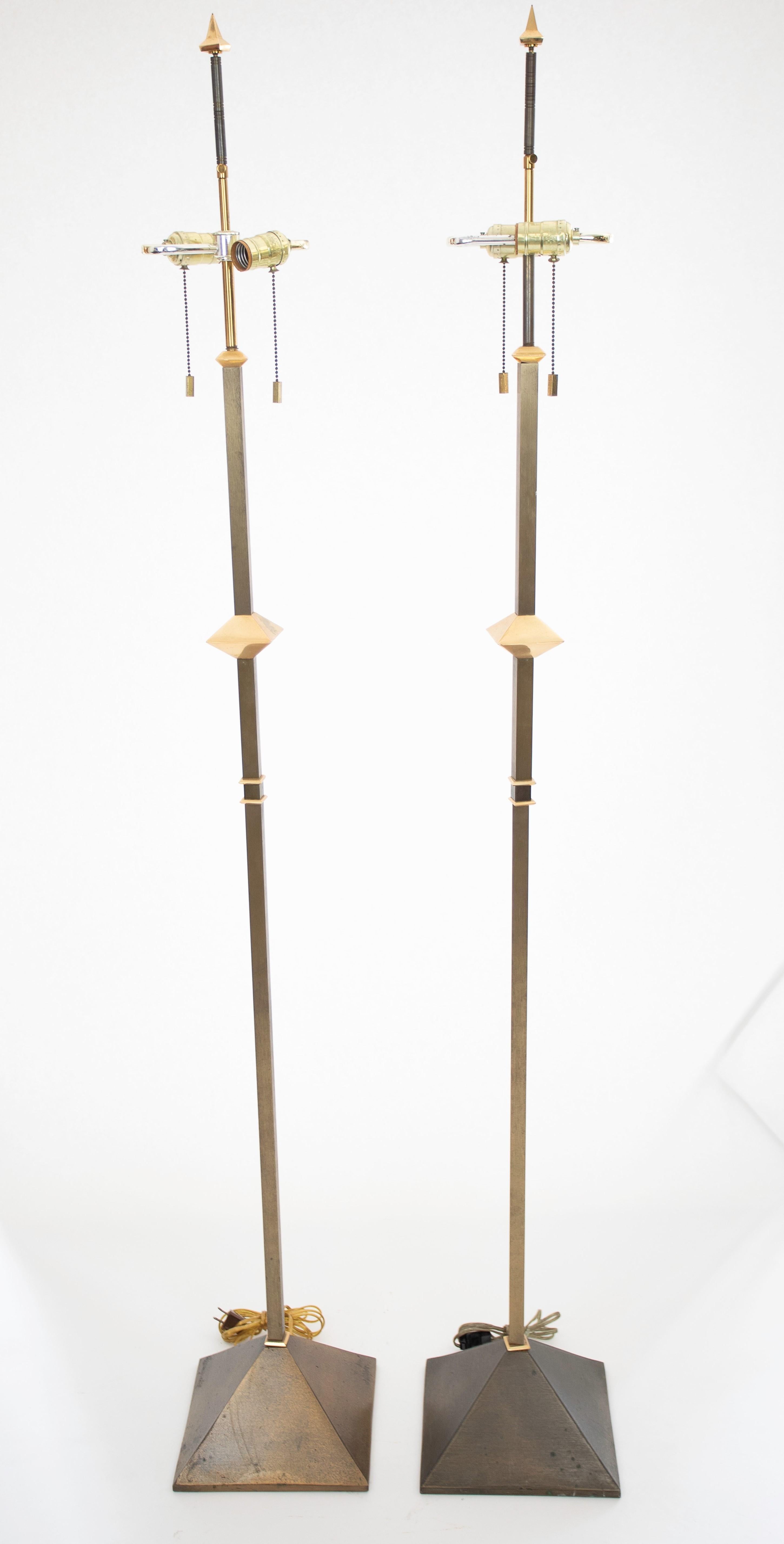 A matched pair of Karl Springer floor lamps
executed in the style of Maison Jansen.