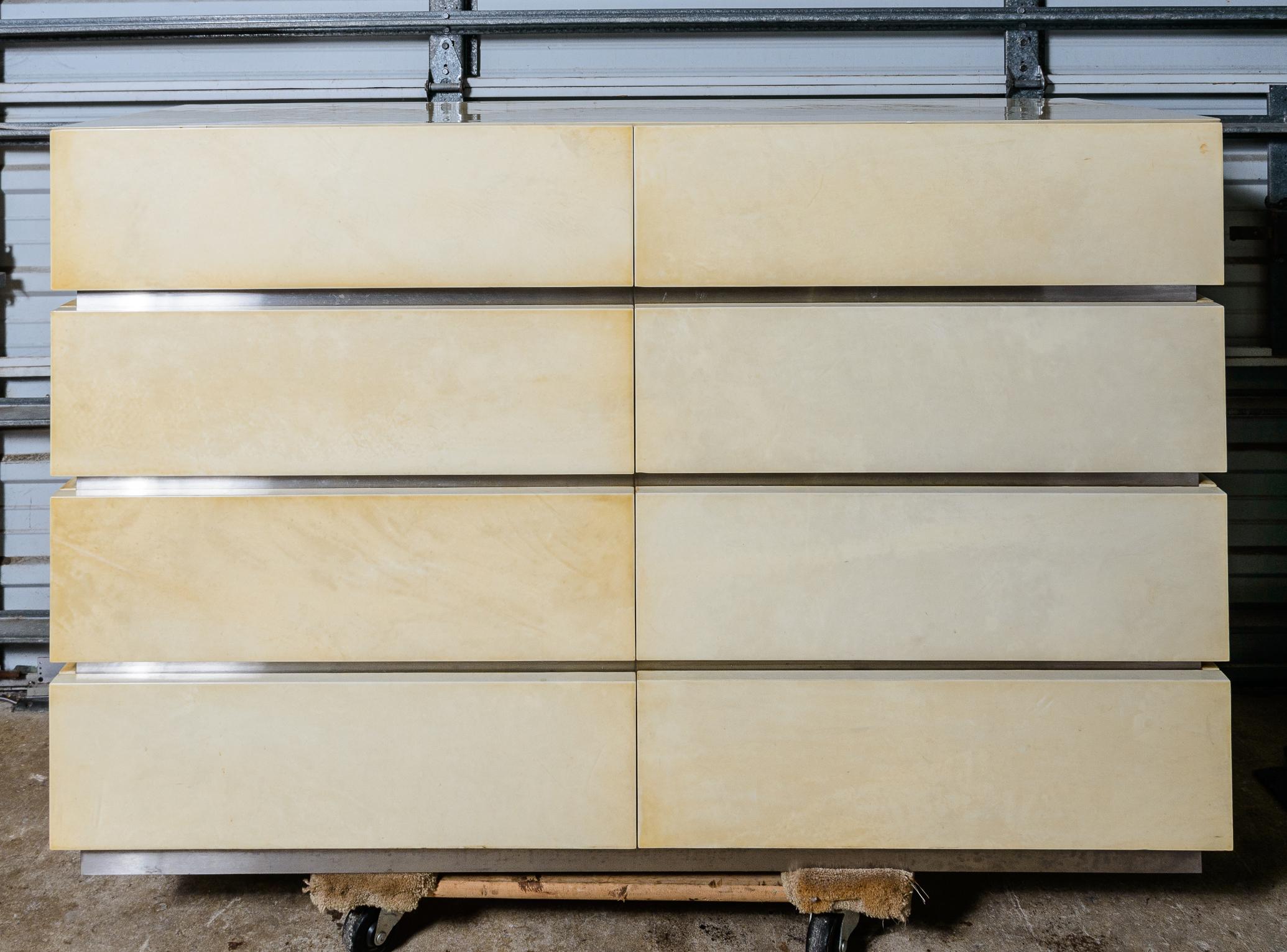 An extremely rare cabinet by Karl springer
Goatskin and steel
Subtle recessed drawer surrounds
A good selection of cream colored goatskin

