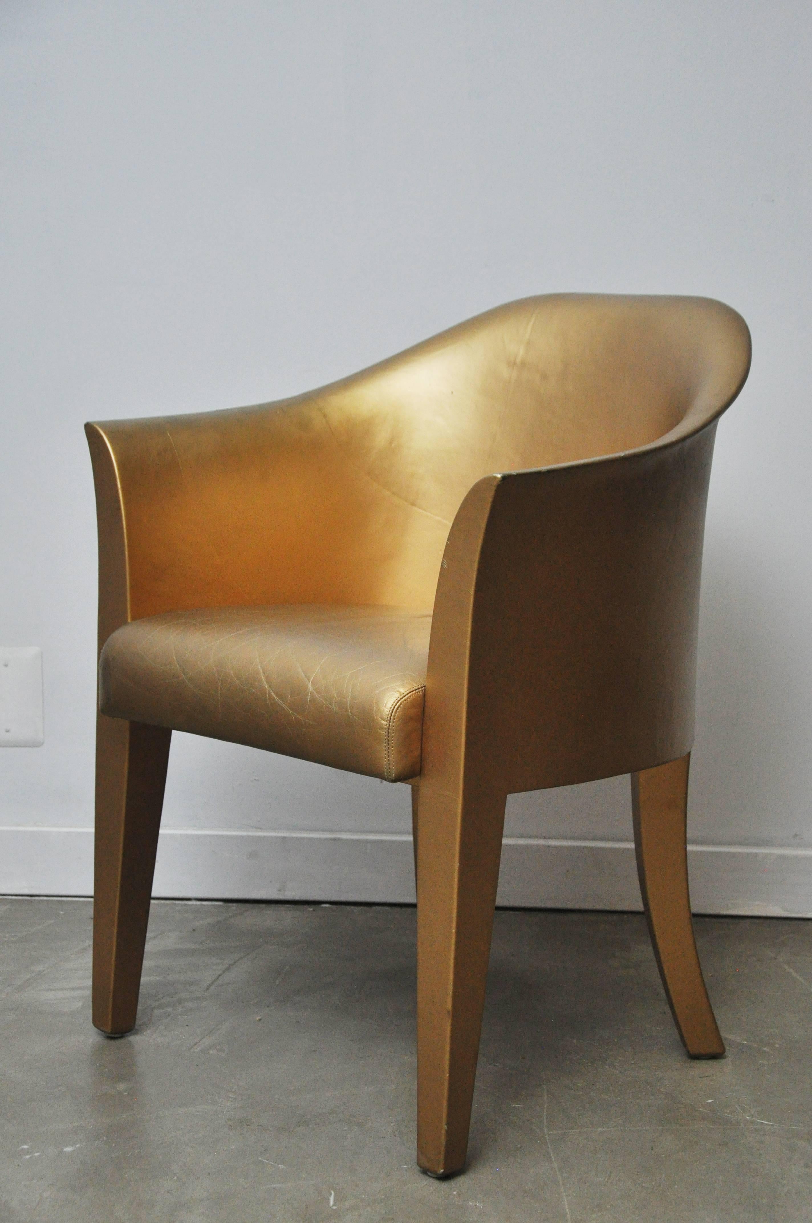 Armchair covered in gold leather. Karl Springer, 1994.