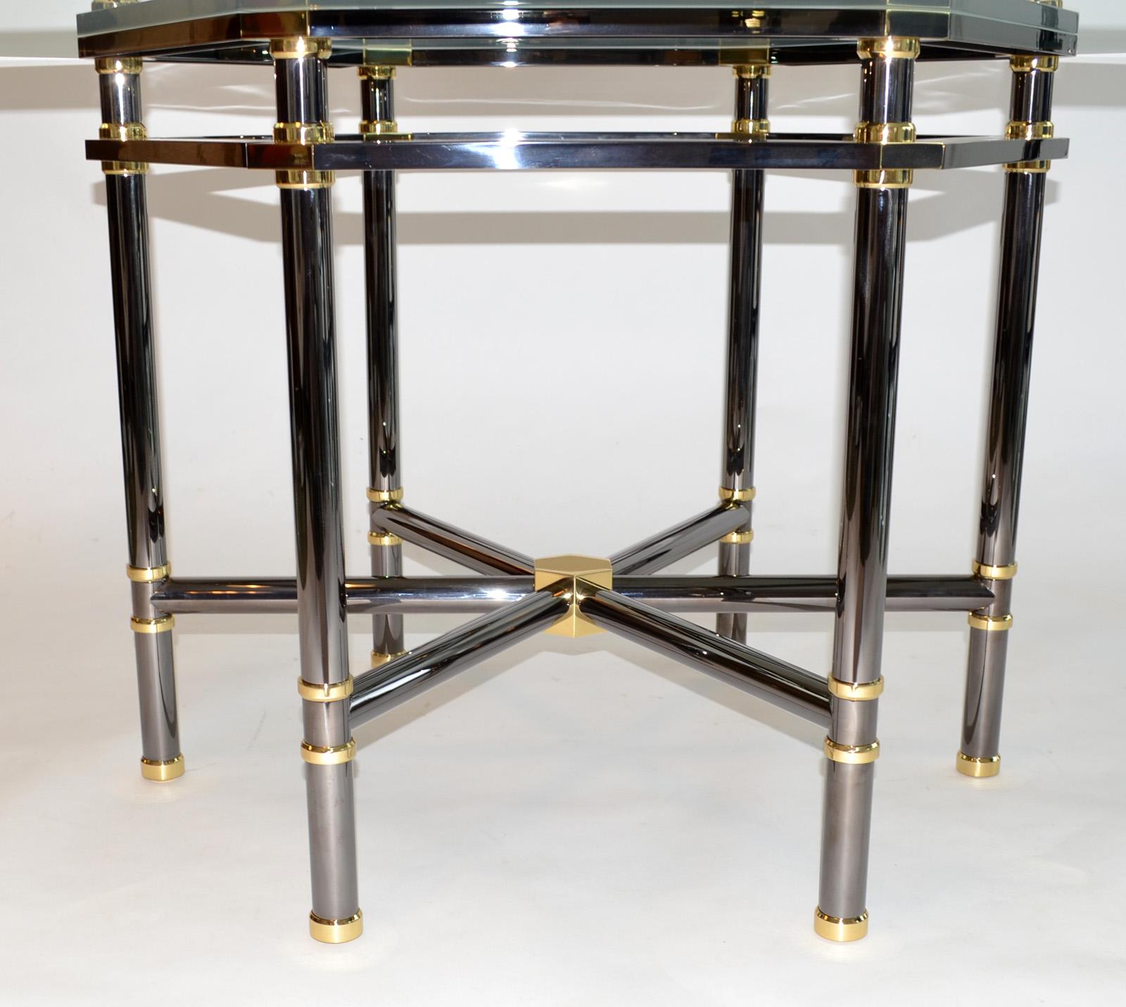 Karl Springer Jansen Style Dining Table 1980s
This iconic 1980s piece from the renowned Karl Springer Workshop is a  masterpiece of metalworking craftsmanship. The striking wagon wheel spoked design, featuring a hexagonal 60