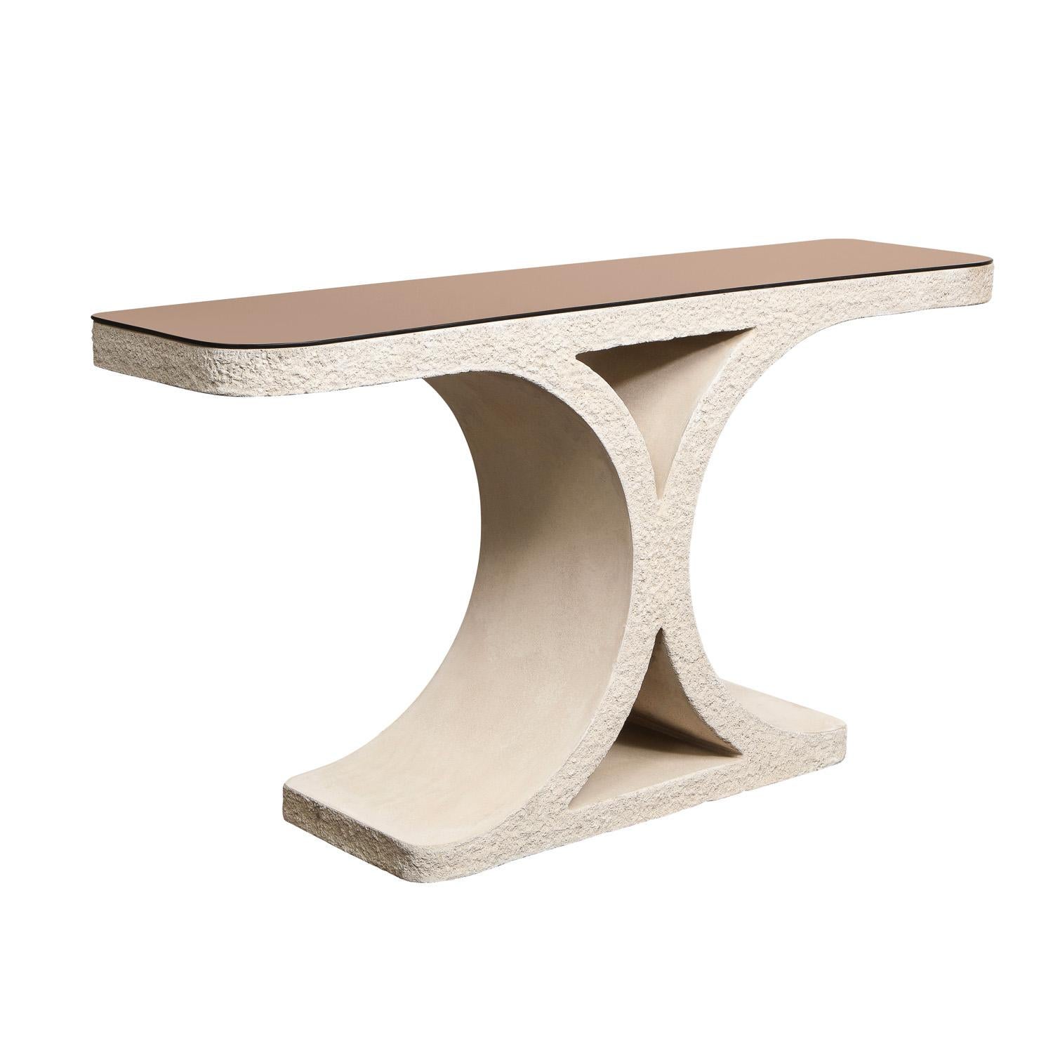 Rare and exceptional “J.M.F. Sandstone Console” table in cast sandstone with bronze mirror top by Karl Springer American, 1980's. This console is a testament to Springers craftsmanship and mastery of materials. It’s a work of