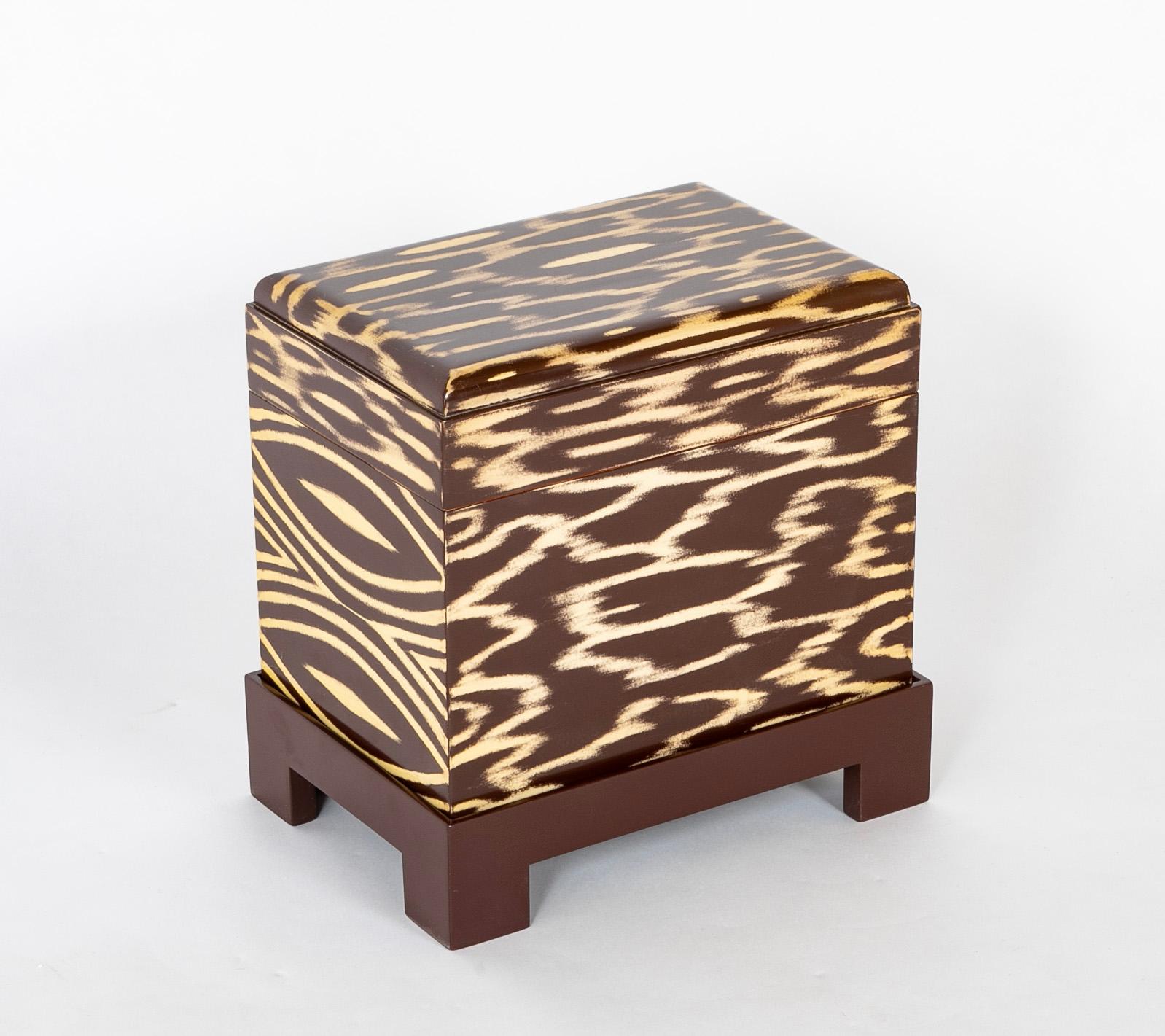  The Kyoto Box on stand is a striking example of Karl Springers lacquer work.   Produced most likely at the height of production in the1980's.   A variation of this piece can be seen in the promotional material Karl Springer put out at the time. 