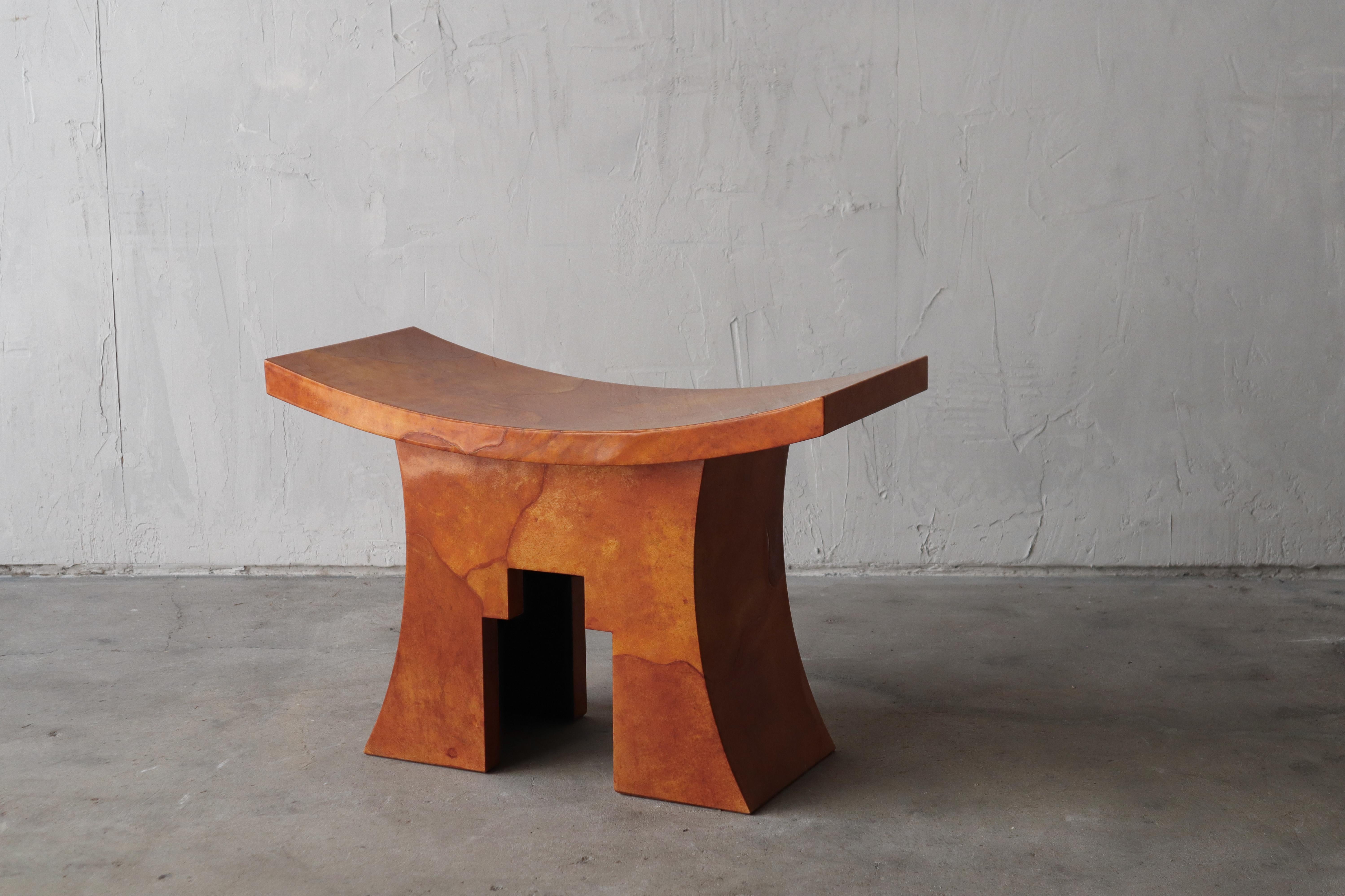 This rare original Karl Springer stool is amazing. The stool is lacquered goatskin, in a beautiful rusty orange color, this a design piece truly worth coveting.

The stool is in incredible condition. There are only a couple small flaws in the