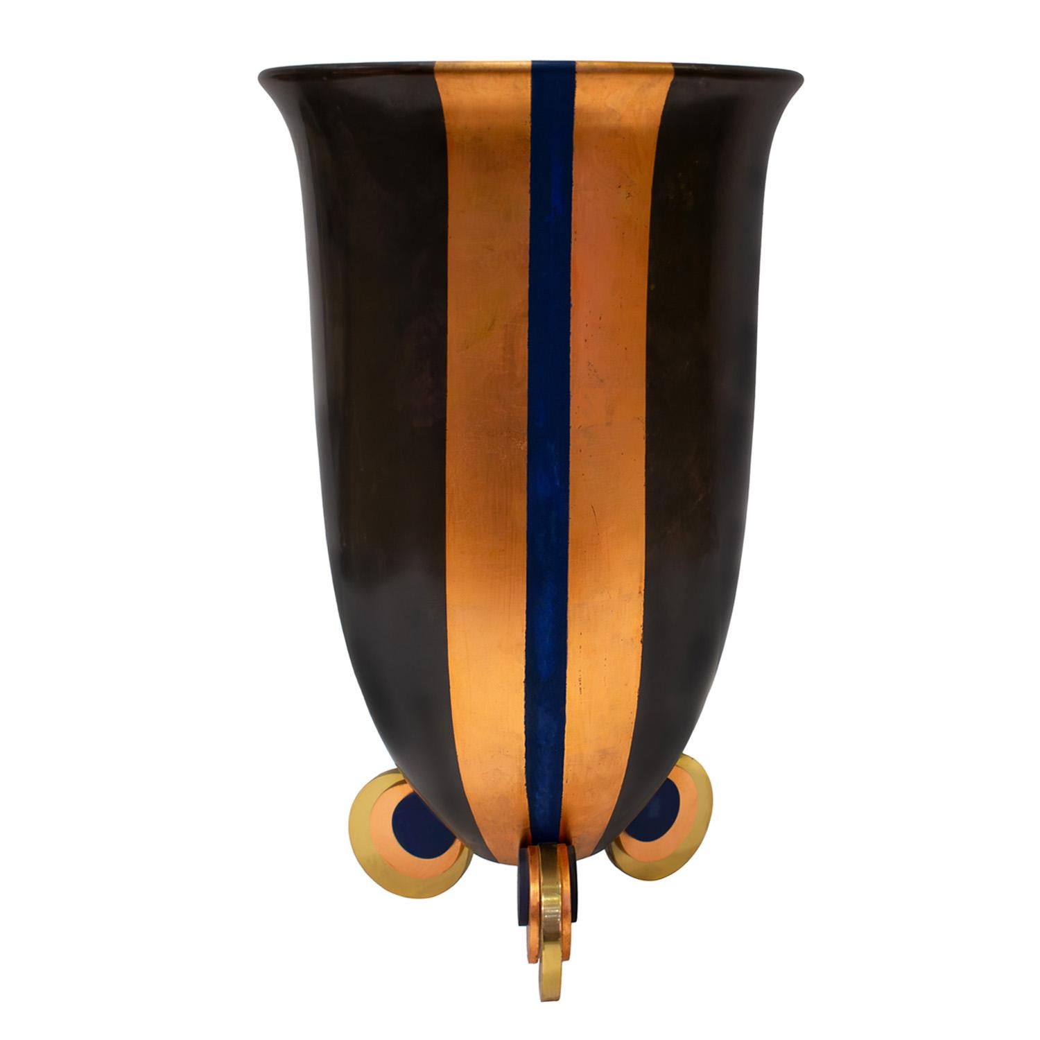Large and exceptional Art Deco urn in bronze with applied copper leaf and blue enamel with disc feet by Karl Springer, American 1980's. The scale and opulent colors make this urn a stand out.  It’s absolutely magnificent.

Reference:
LOBEL MODERN