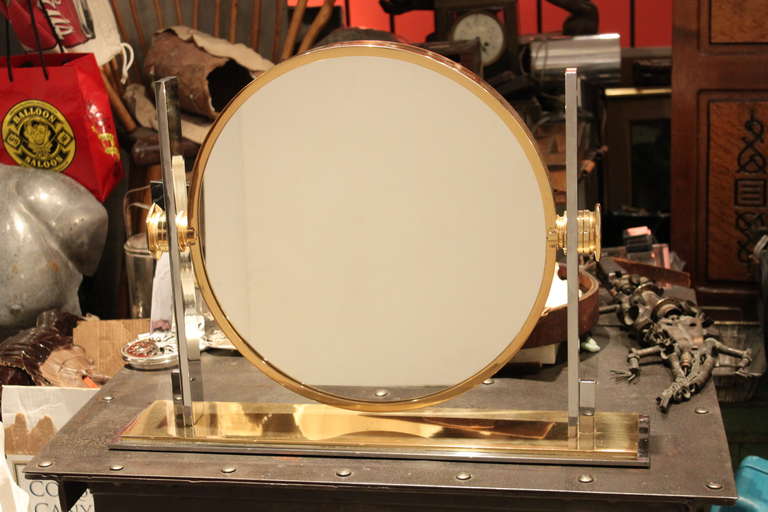 This is a fine example of what is arguably one of Karl Springers most iconic designs. These mirrors are typically found in the smaller size. This is the medium-sized example. These are 2 sided and super heavy quality. This example is in excellent
