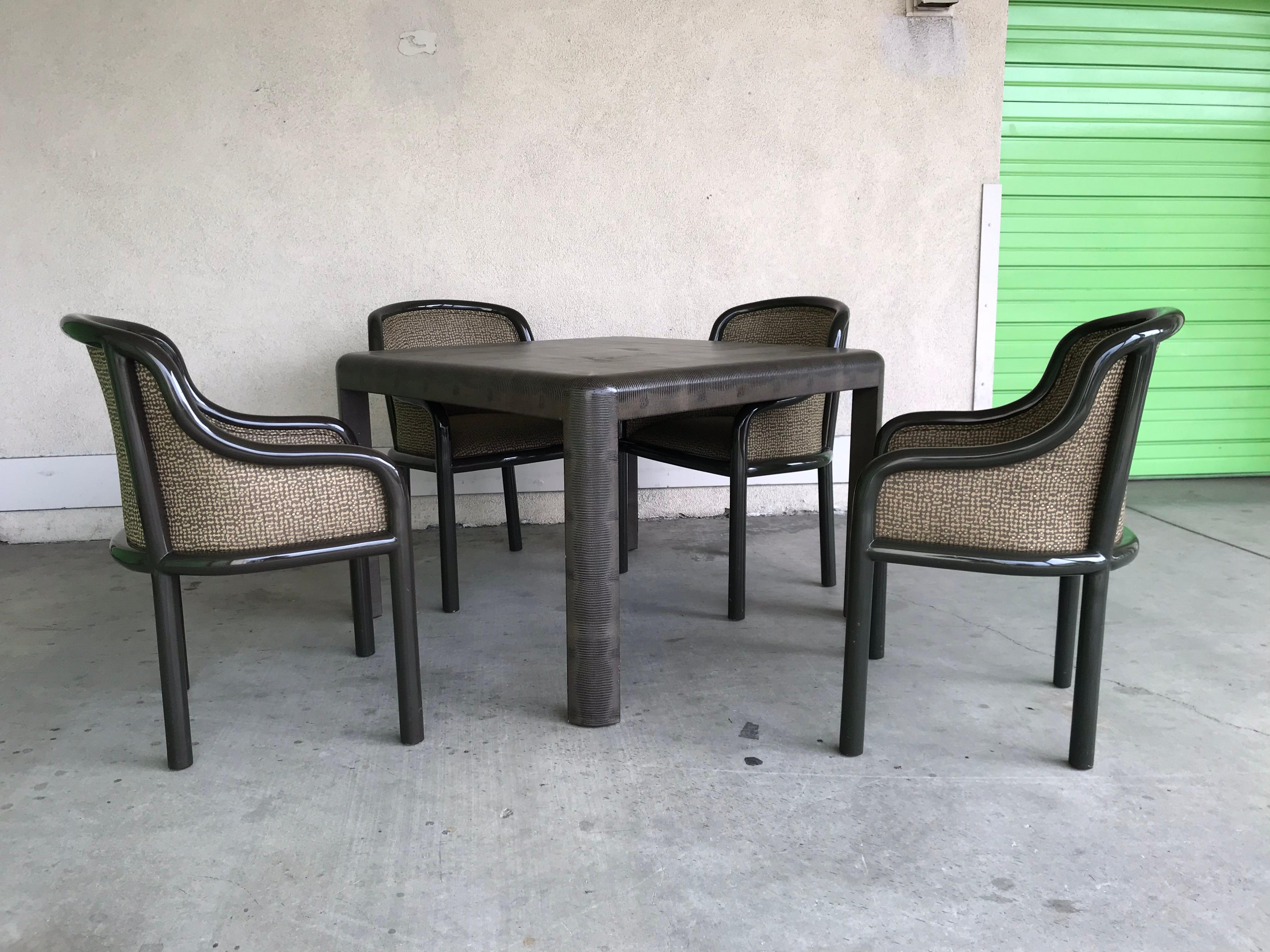 A handsome and elegant design.
The table is constructed of wood and wrapped with leather embossed snake skin pattern in gun metal hue. The size is 29