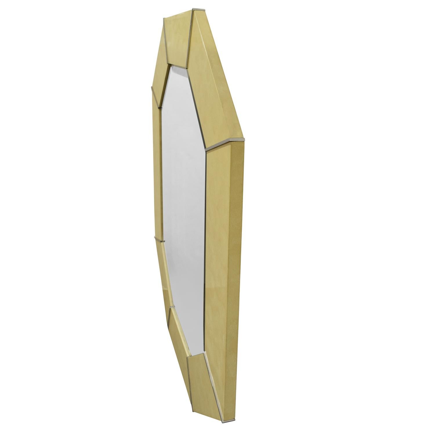 8 Sided mirror with custom artisan ivory lacquer and polished chrome accents by Karl Springer, American, 1970s. The mirror is beveled. A classic Springer design.

Reference:
Karl Springer LTD paper catalog published in the 1970s, section titled