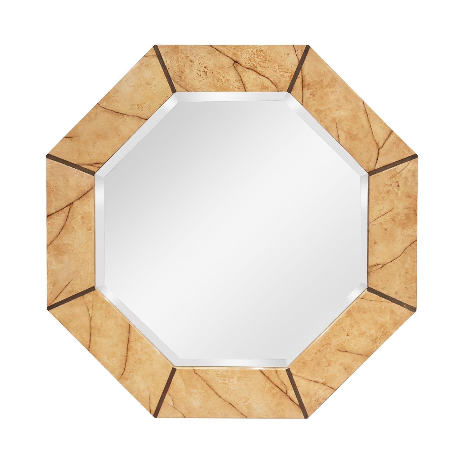 Octagonal wall hanging mirror in superb artisan marble lacquer with bronze accents and beveled mirror by Karl Springer, American 1980s. Springer worked with artists who could accomplish the most complex and realistic finishes. This lacquer work is