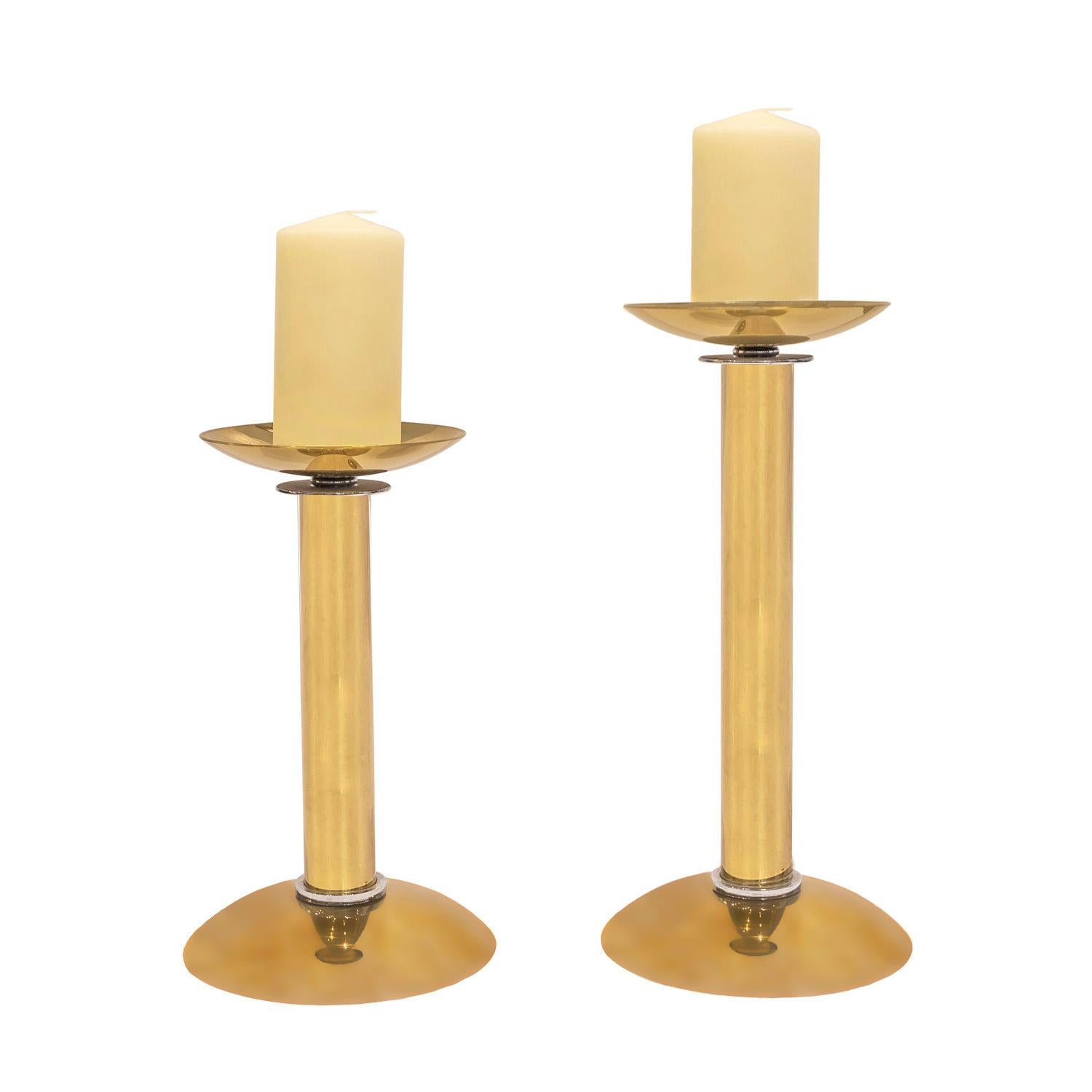 Pair of candle holders in brass with chrome accents by Karl Springer, American 1980's. These iconic Karl Springer candle holders are both chic and beautifully made.

Reference 
Karl Springer Red Binder Catalog, published in the 1980’s, Section