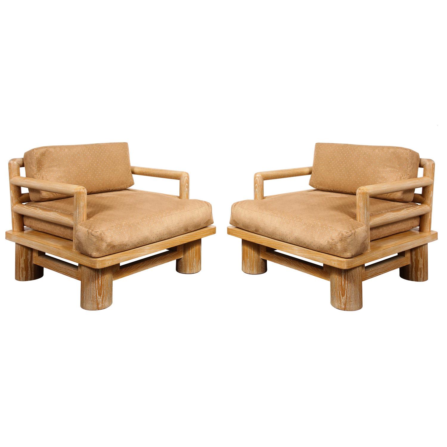 Pair of meticulously crafted lounge chairs, 
