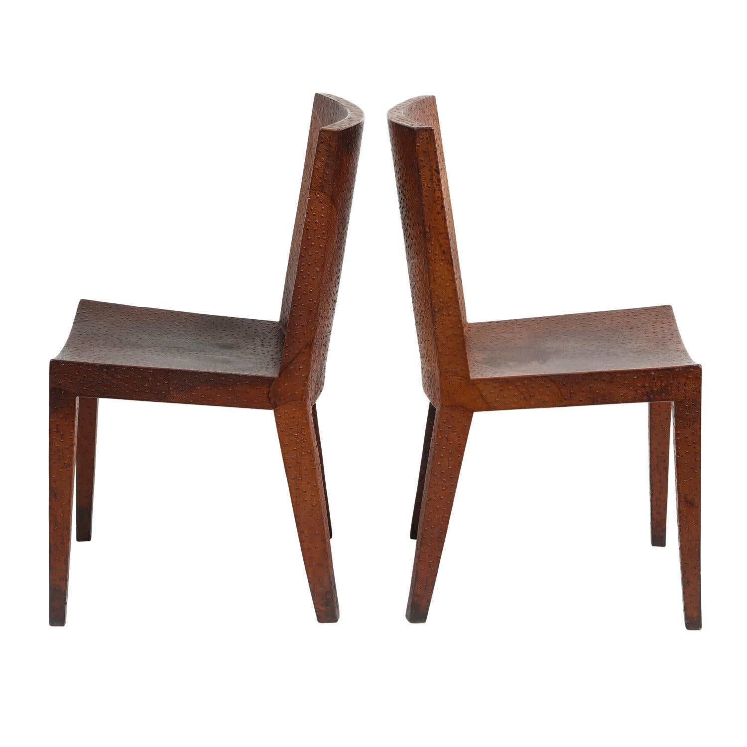 Pair of JMF chairs in ostrich skin by Karl Springer, American 1982 (signed “Karl Springer 1982” on leather label beneath seat). These chairs are exquisitely crafted.

Reference: Karl Springer red binder catalog, 1980’s, seating section, a full