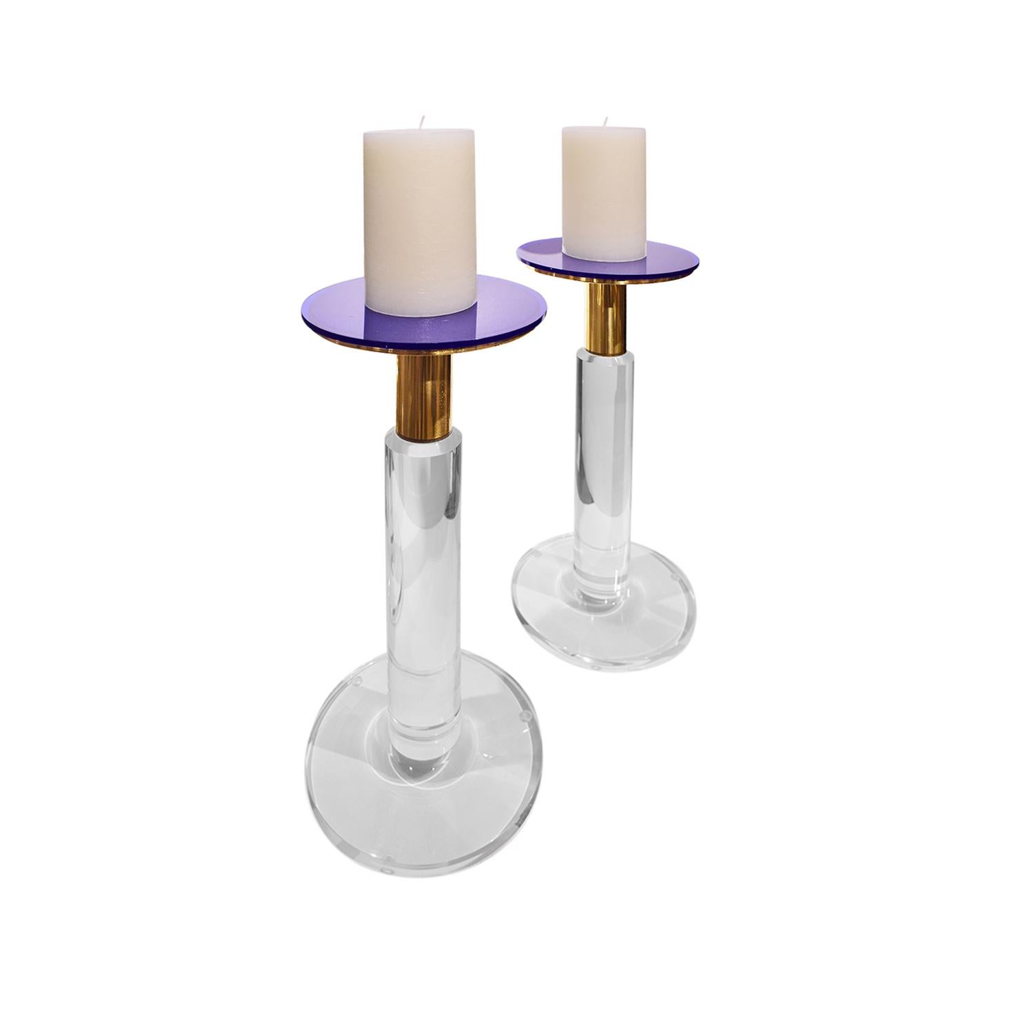 Pair of rare prototype candleholders in Lucite and brass by Karl Springer, American, circa 1985. Only a small number of these were made.

Provenance:
From the Collection of a Karl Springer Employee

Reference:
Authentication from Karl Springer