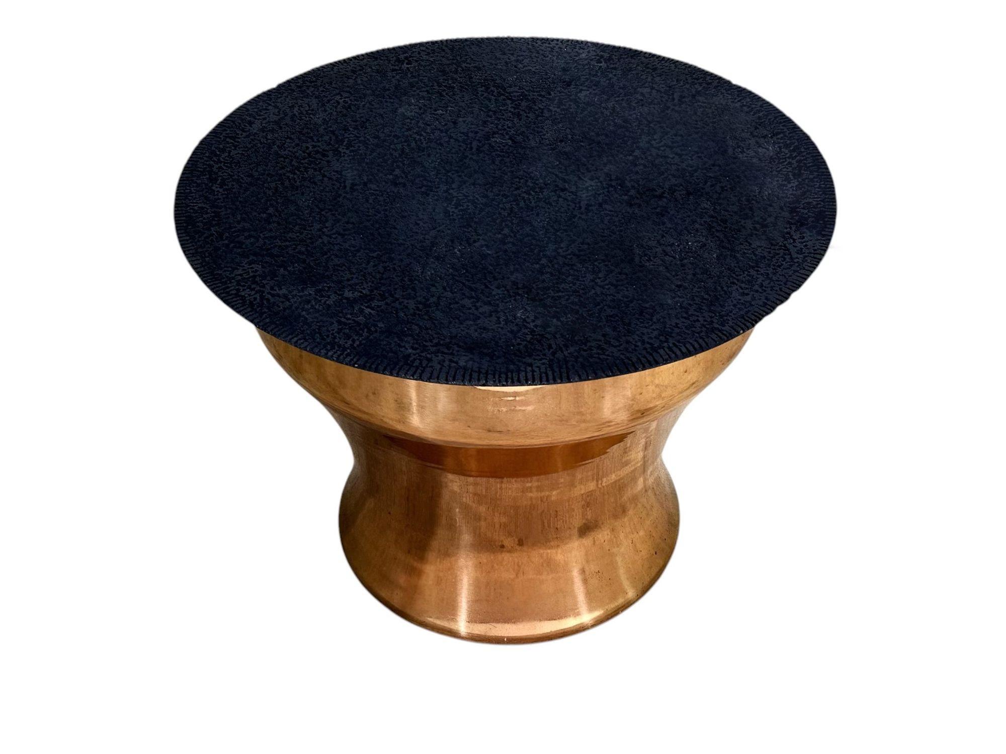 Karl Springer Rain Drum table with concrete top, 1970’s. Concrete top is a knife edge. Beautiful patina.
Measures 19.5” tall 26” diameter