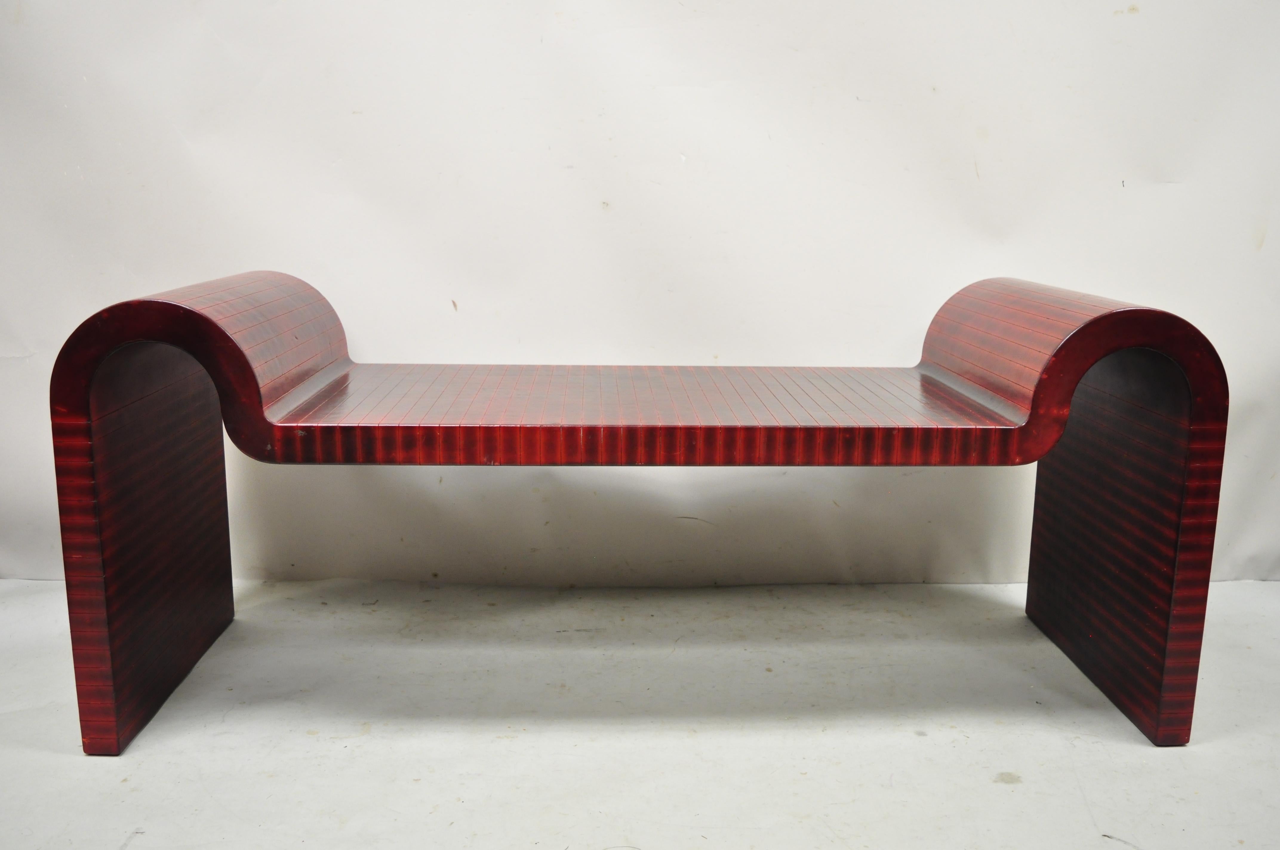 Karl Springer Red Leather Art Deco sculptural waterfall bench Mid-Century Modern. Item features red burnished leather wrapped frame, sleek waterfall design, loose cushion, solid wood frame, very nice vintage item, clean modernist lines, sleek