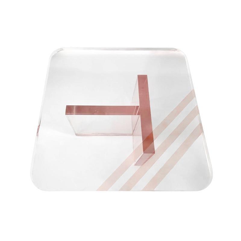 Fabulous Karl Springer rose pink tinted Lucite modern coffee table of the 1970s period. Great addition to your modern inspired interiors. The lucite is thick and heavy and the rare rose pink  tint is spectacular.  The top and bottom pieces are not