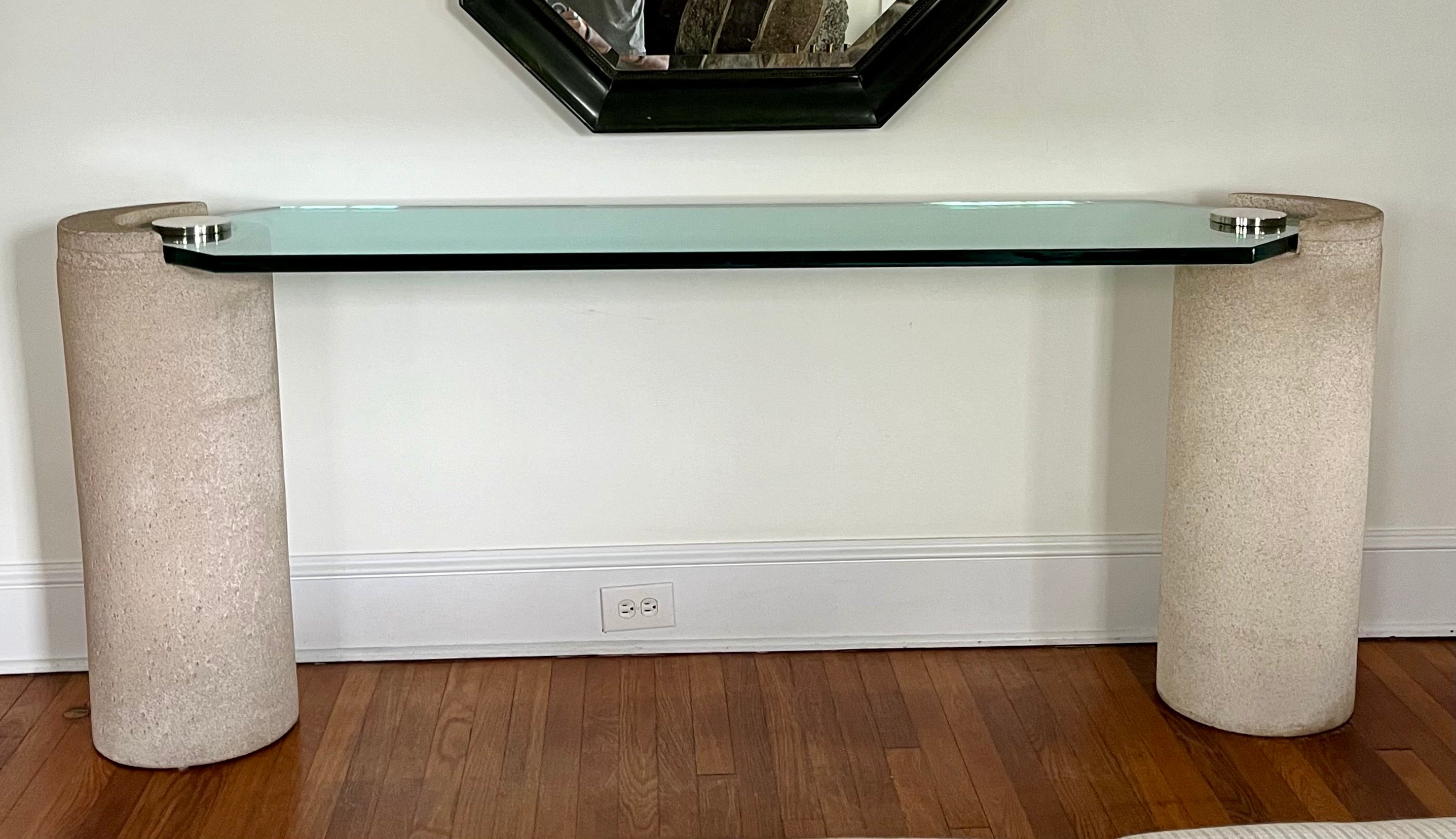 Sandstone Sculpture Console with base in cast composite stone with thick glass top and polished chrome caps by Karl Springer. , American 1980's. The forms and materials are magnificent  together.